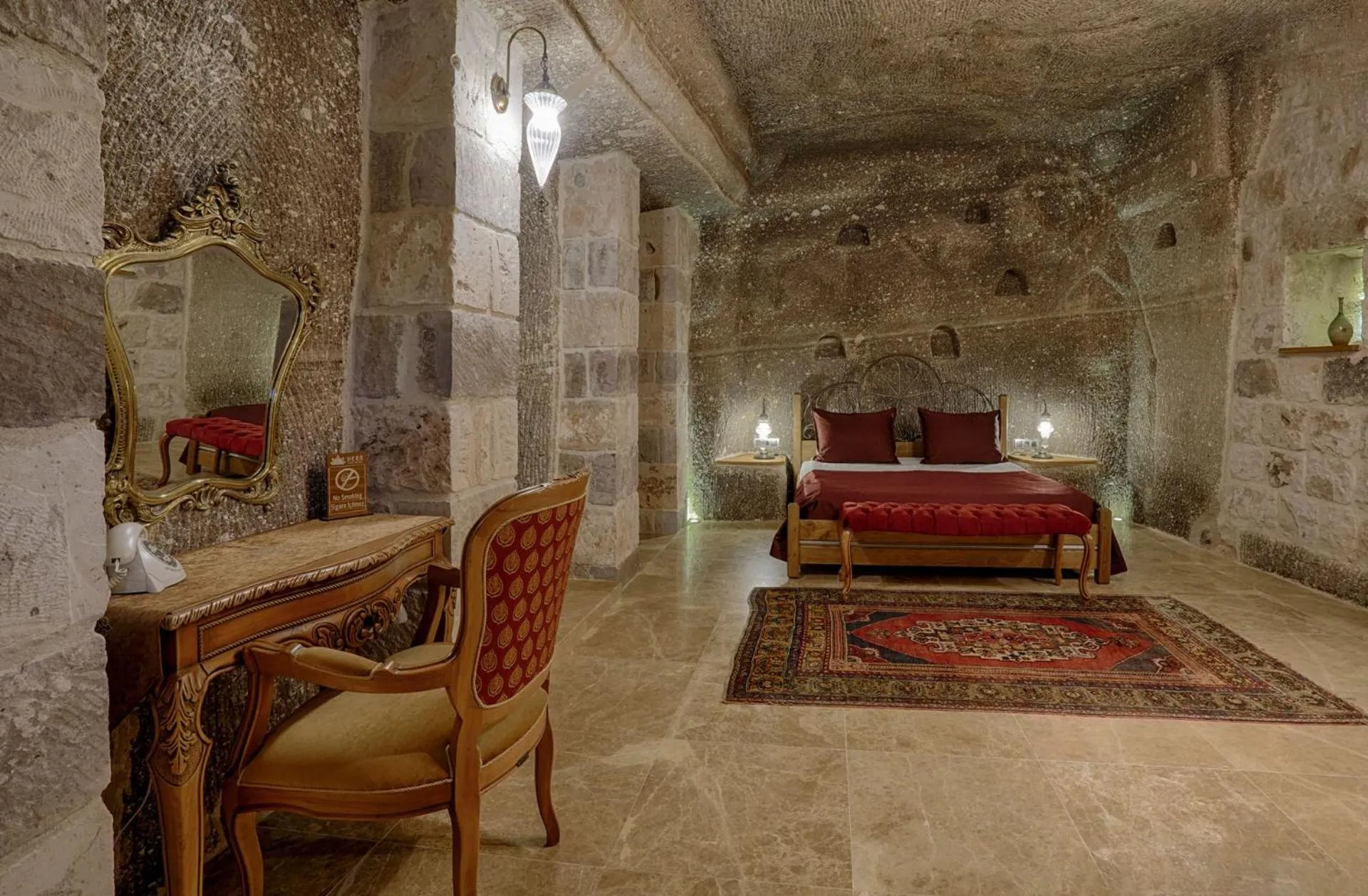 Bed in Hera Cave Suites