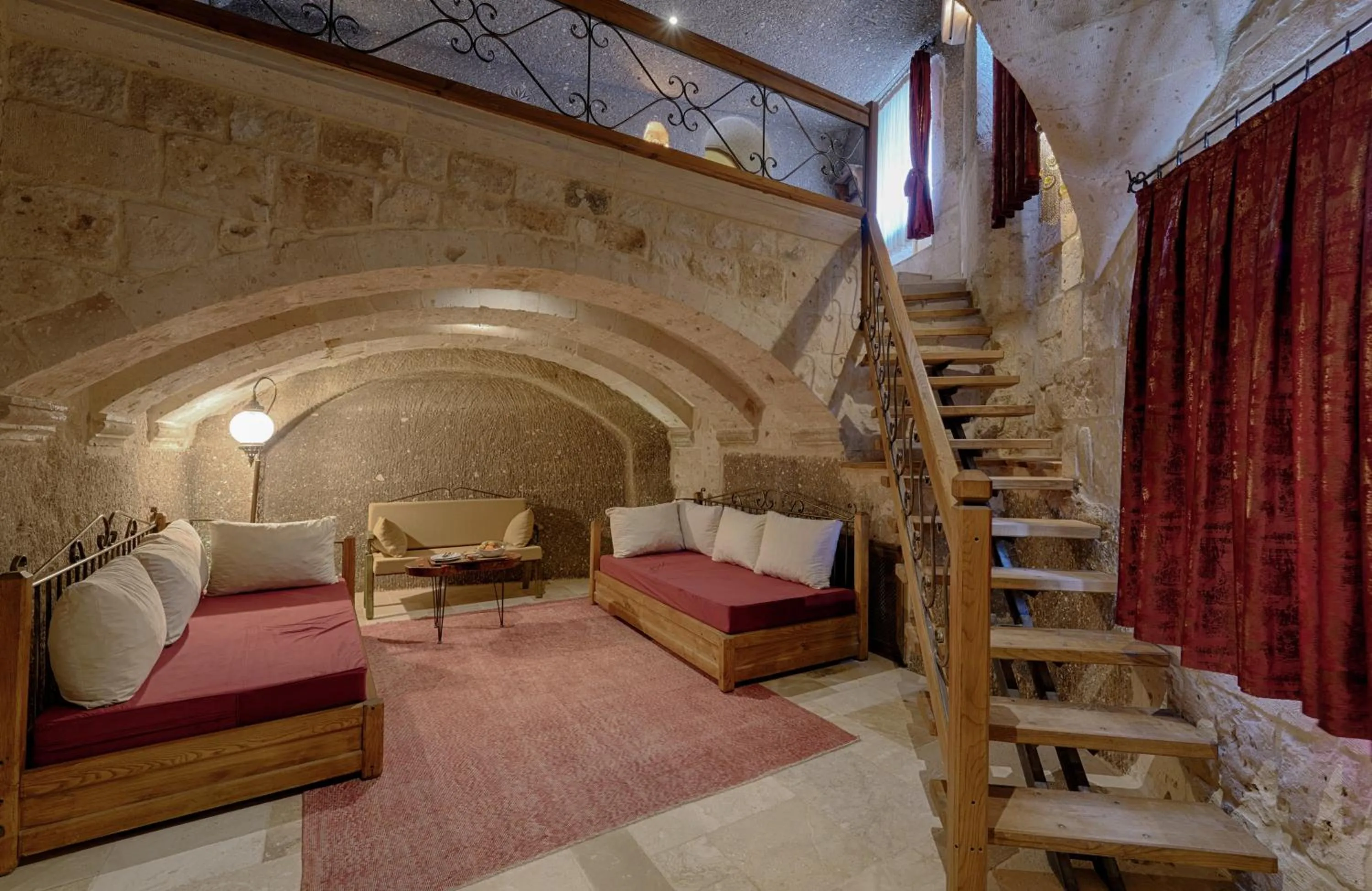 Living room, Bed in Hera Cave Suites