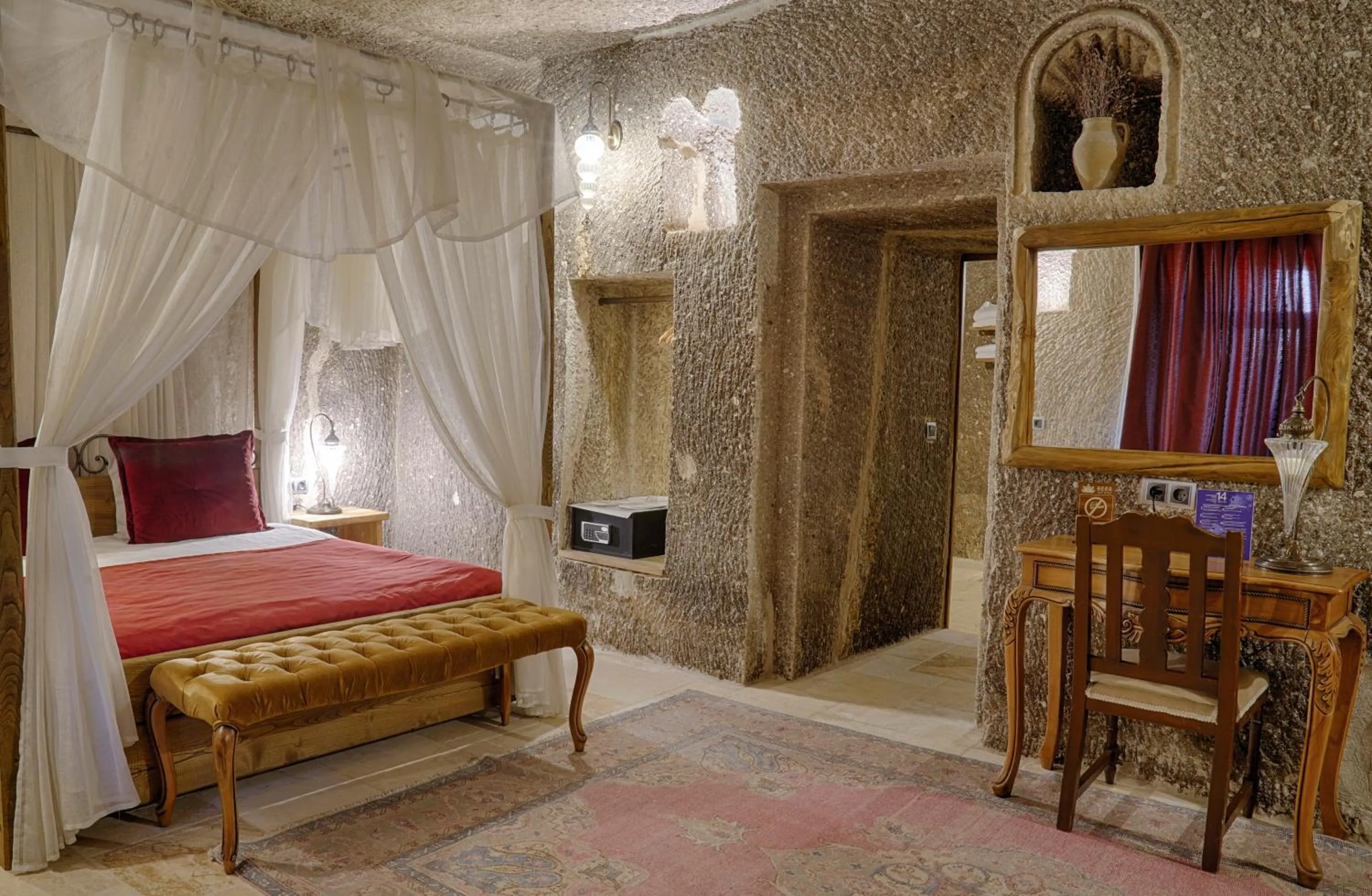 Bed in Hera Cave Suites