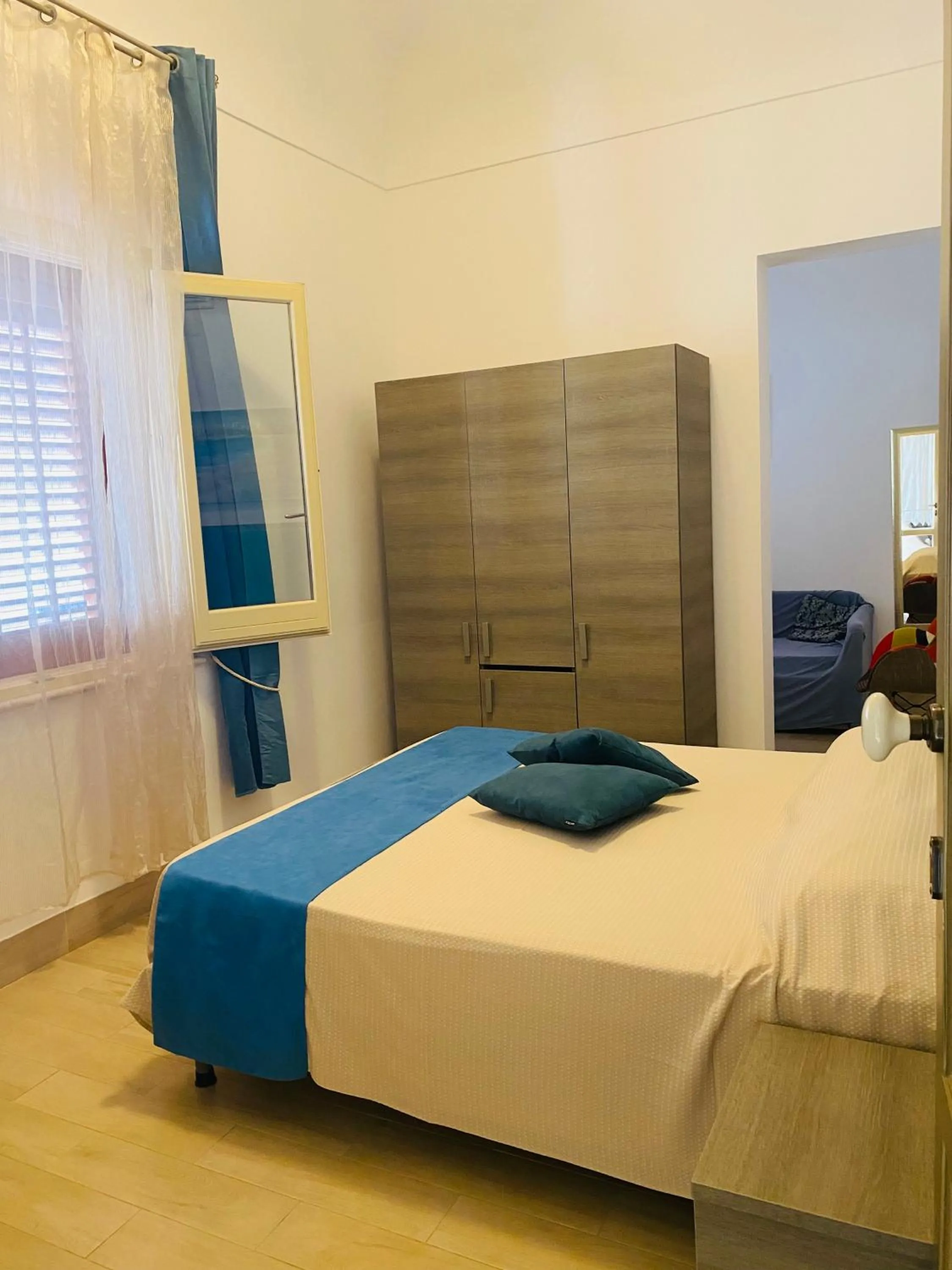 Bed in Albergo Bouganville