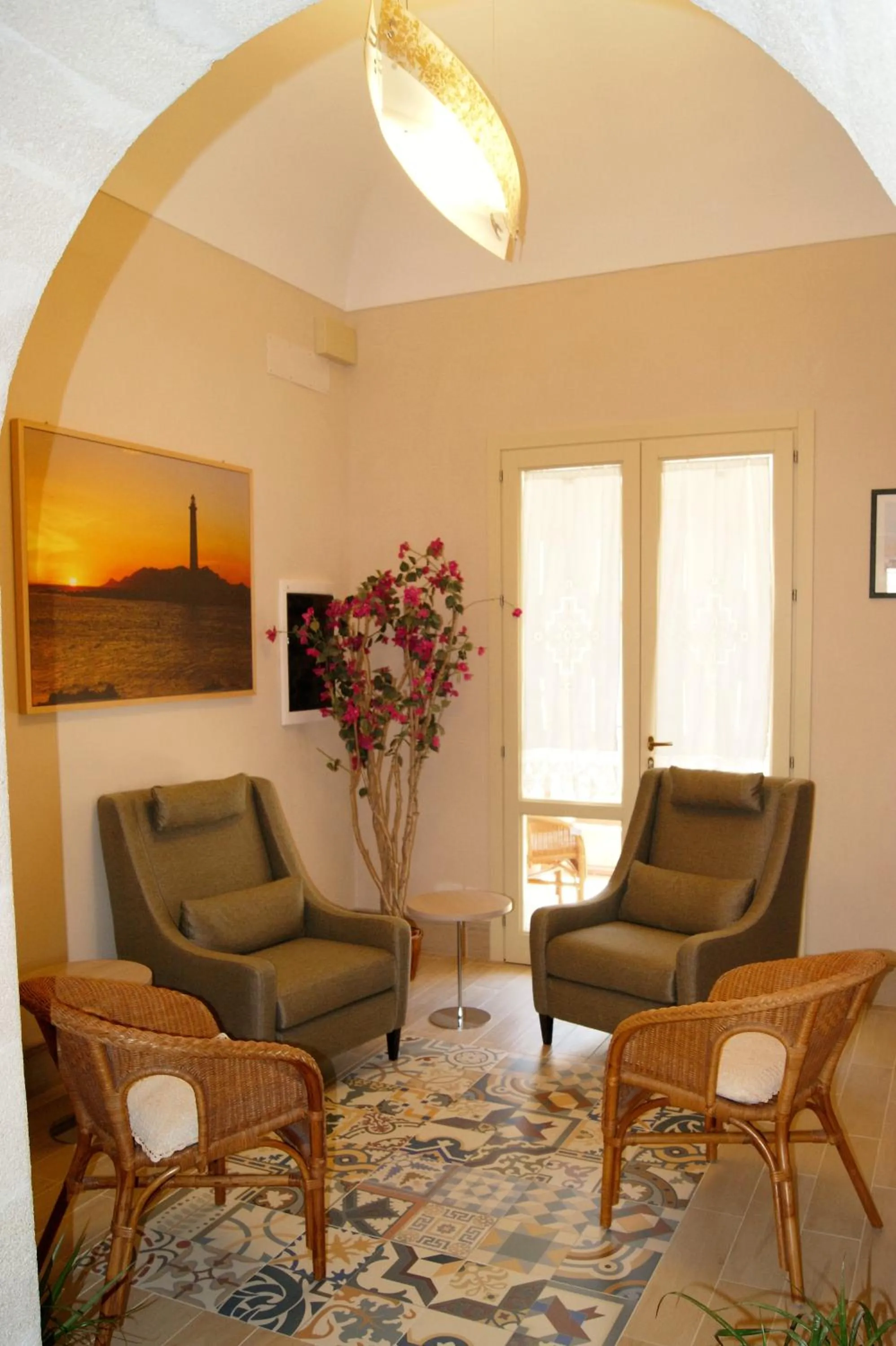 Communal lounge/ TV room in Albergo Bouganville