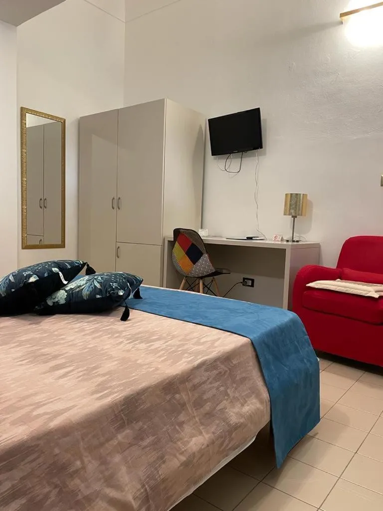 Photo of the whole room, Bed in Albergo Bouganville
