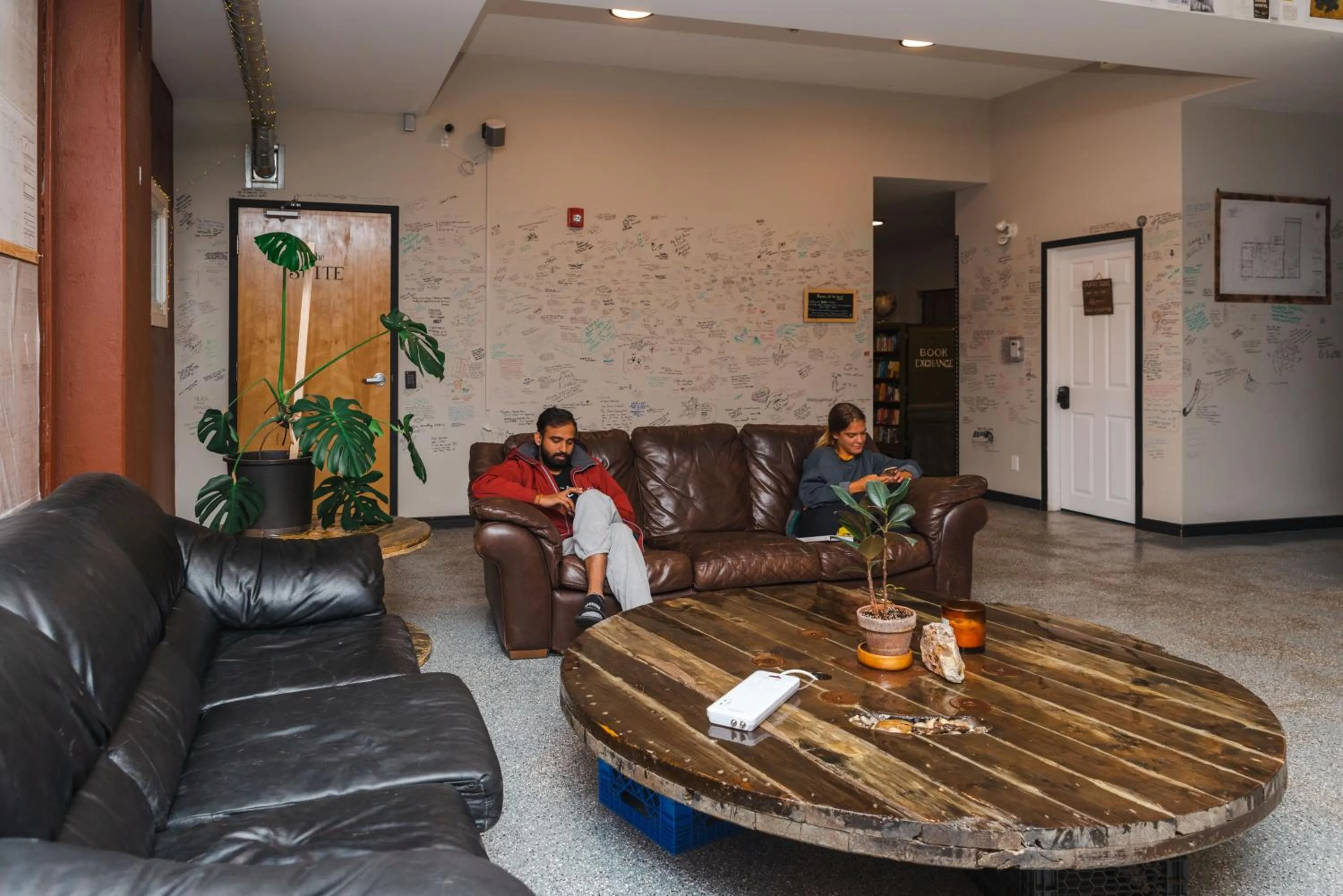 Communal lounge/ TV room in The Haven Hostel