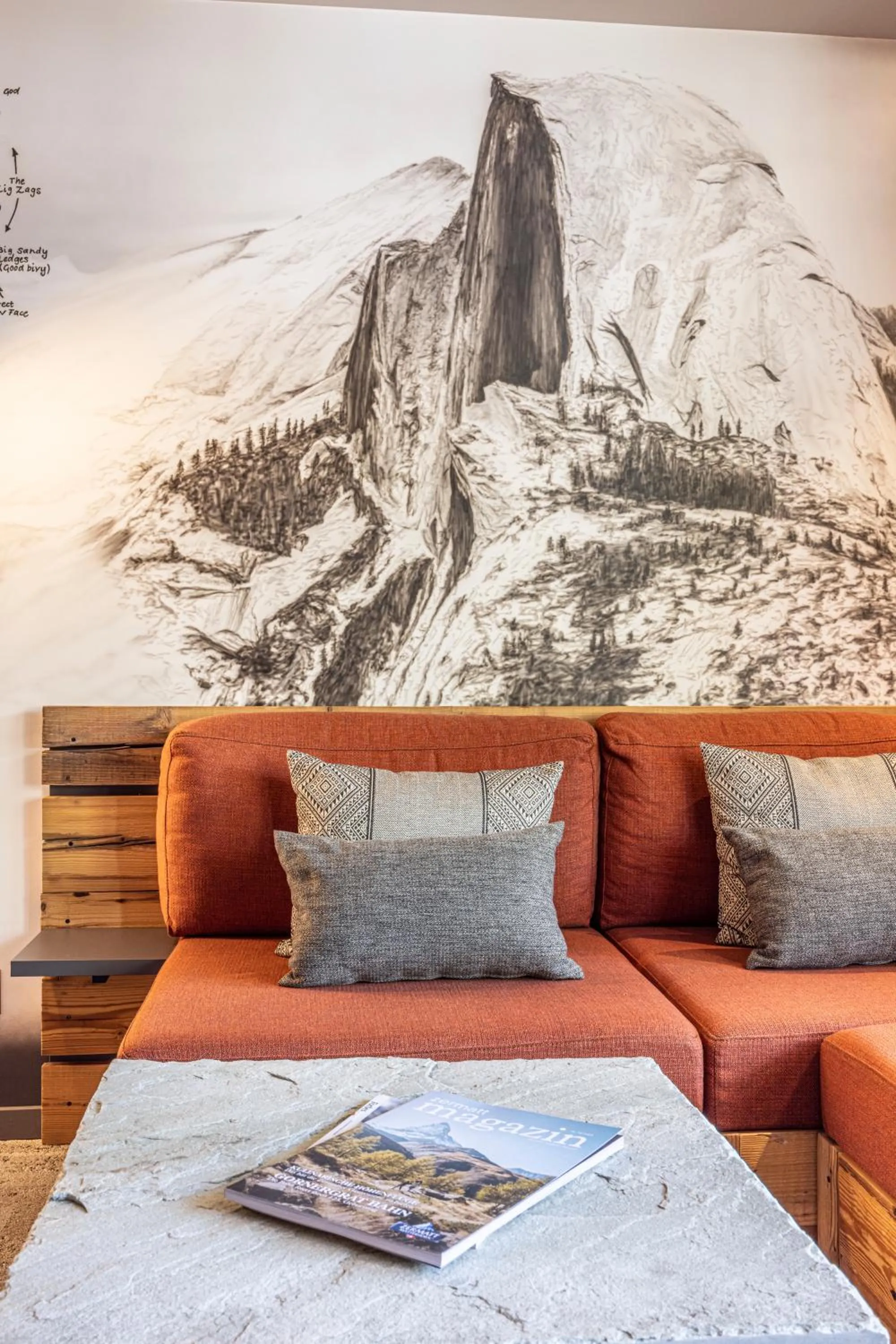 Seating area, Bed in BaseCamp Hotel