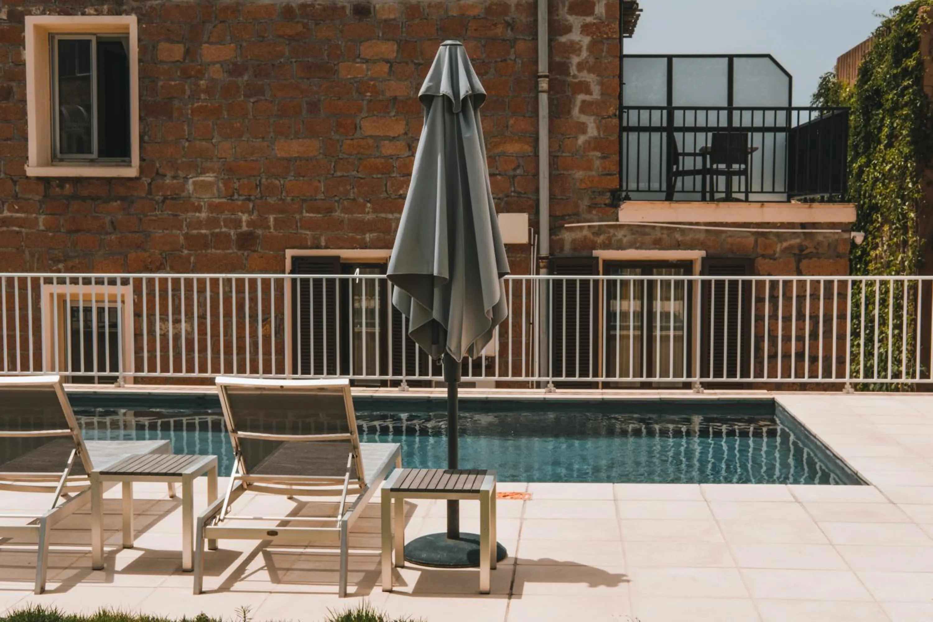 Swimming pool in Hôtel & Résidence Le Subrini