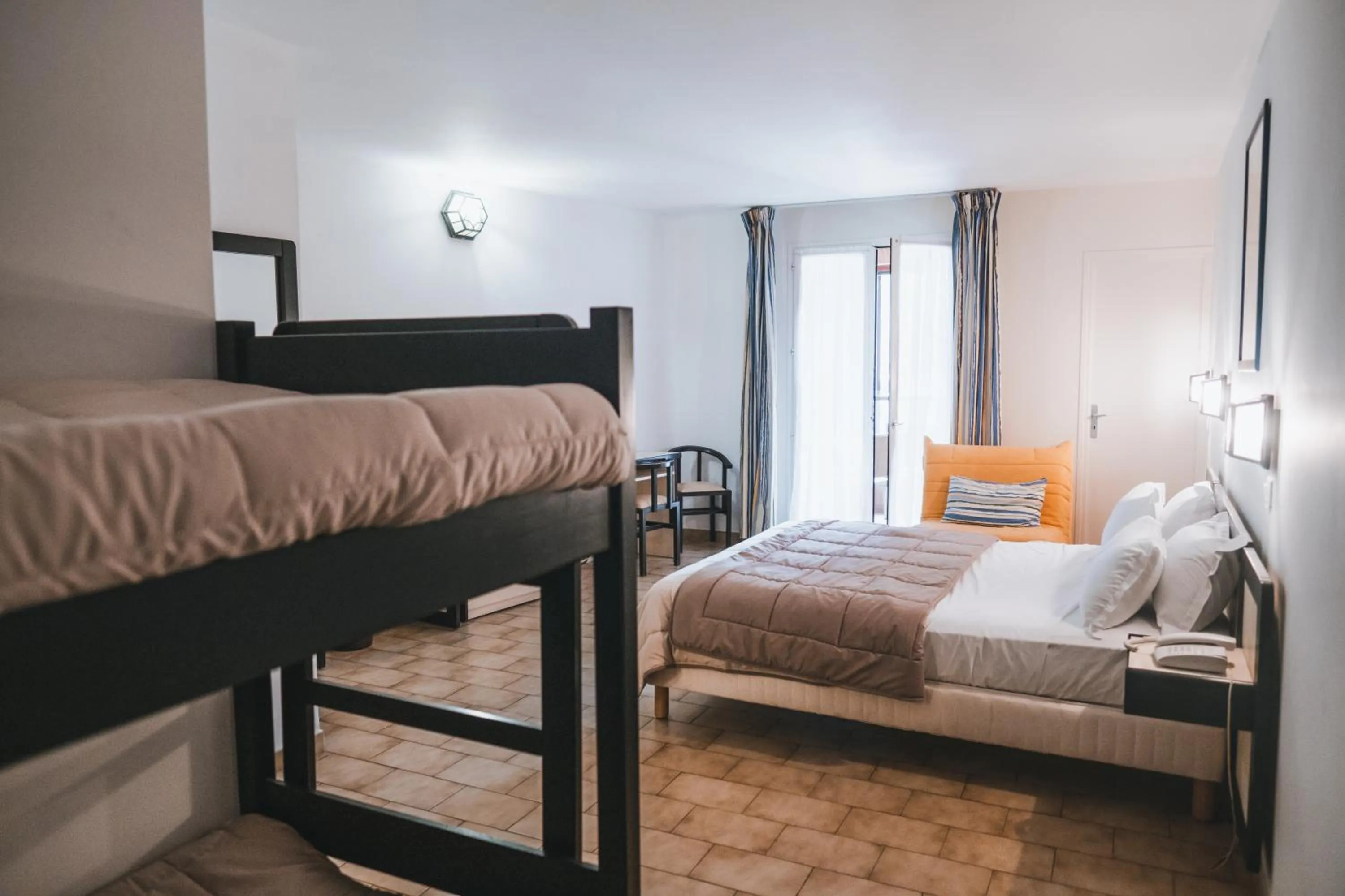 Bed in Hôtel & Résidence Le Subrini