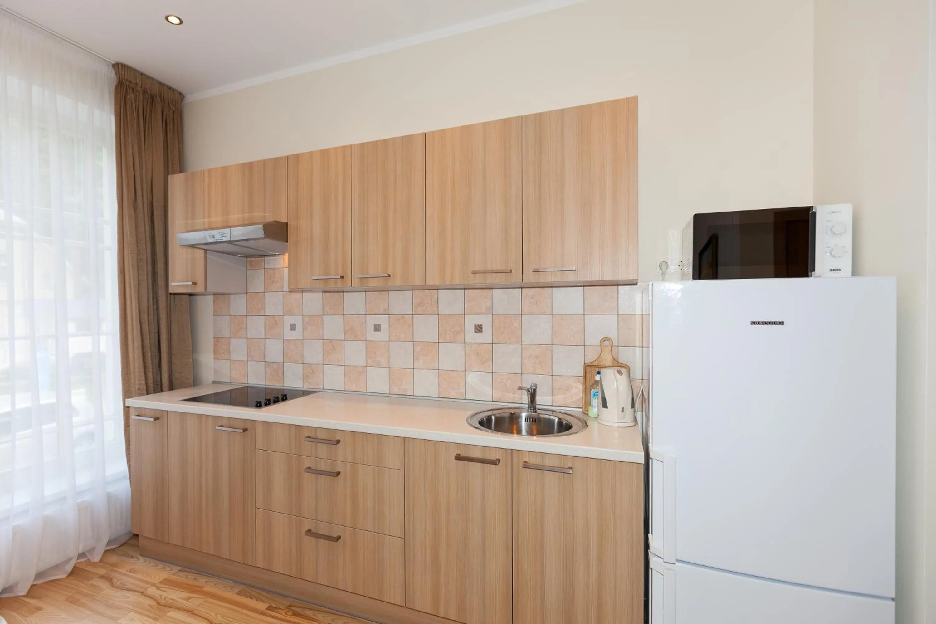 Kitchen or kitchenette in Amber Coast & Sea