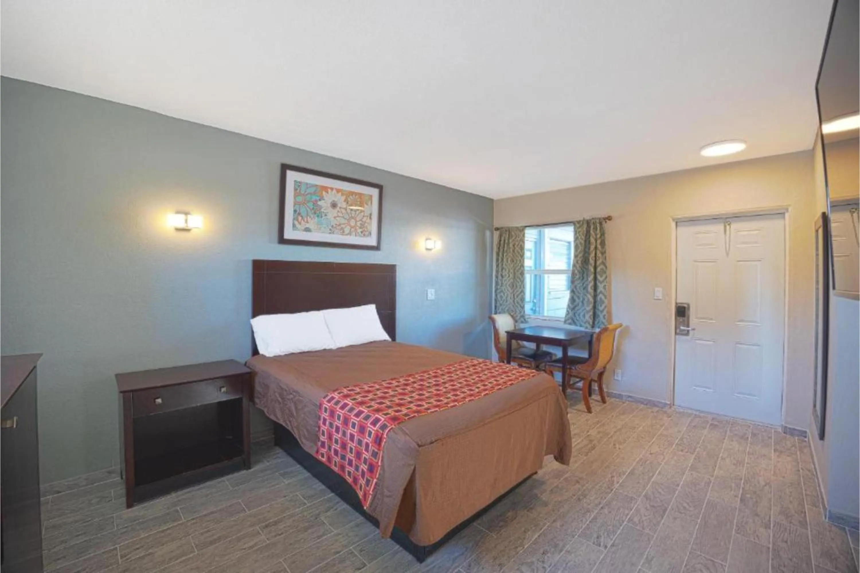 Bedroom, Bed in Sunrise Inn by OYO Titusville FL