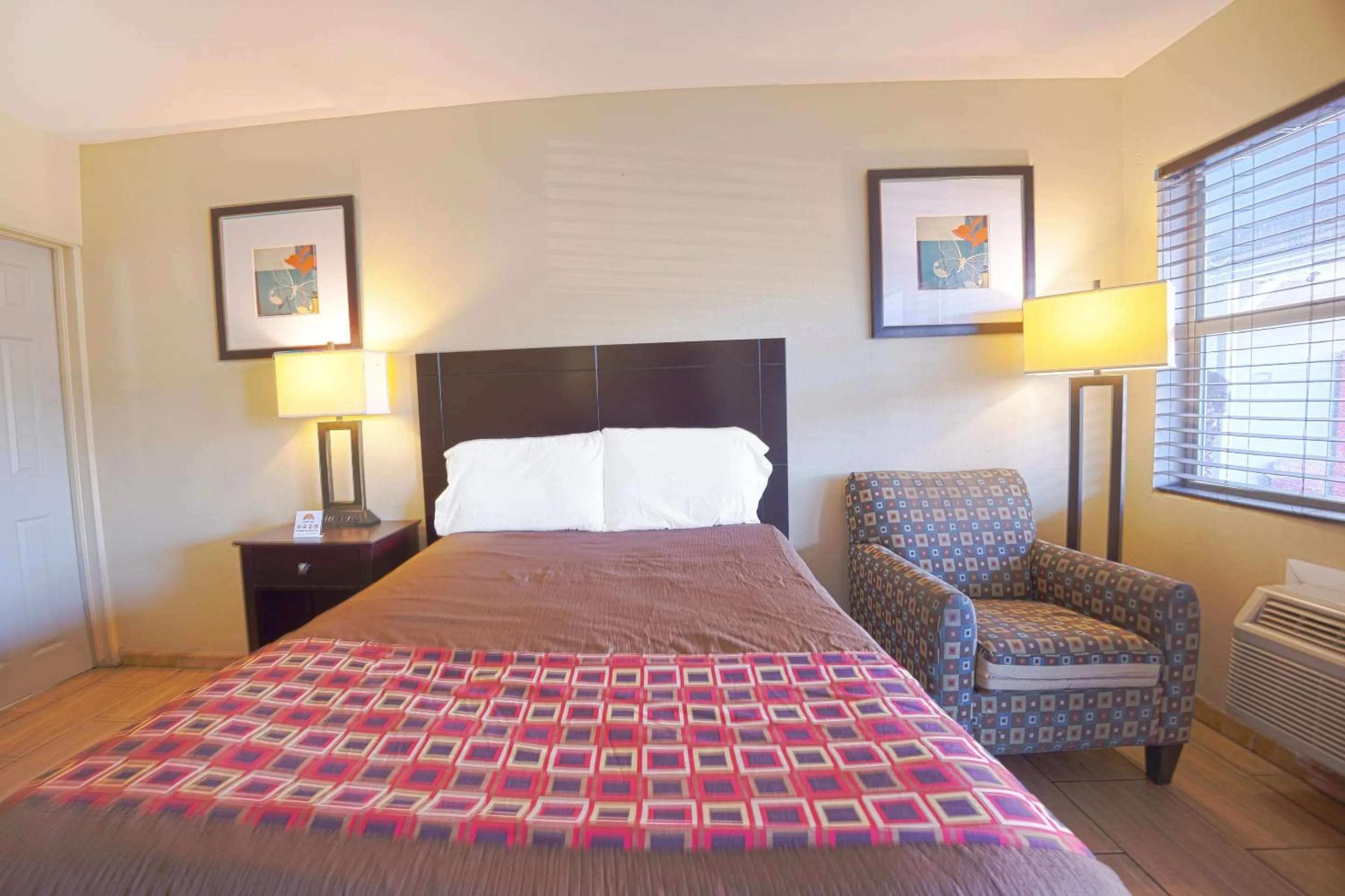 Bedroom, Bed in Sunrise Inn by OYO Titusville FL