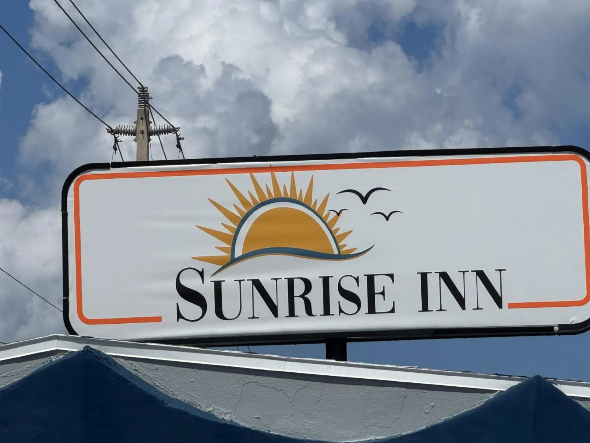 Property building in Sunrise Inn by OYO Titusville FL