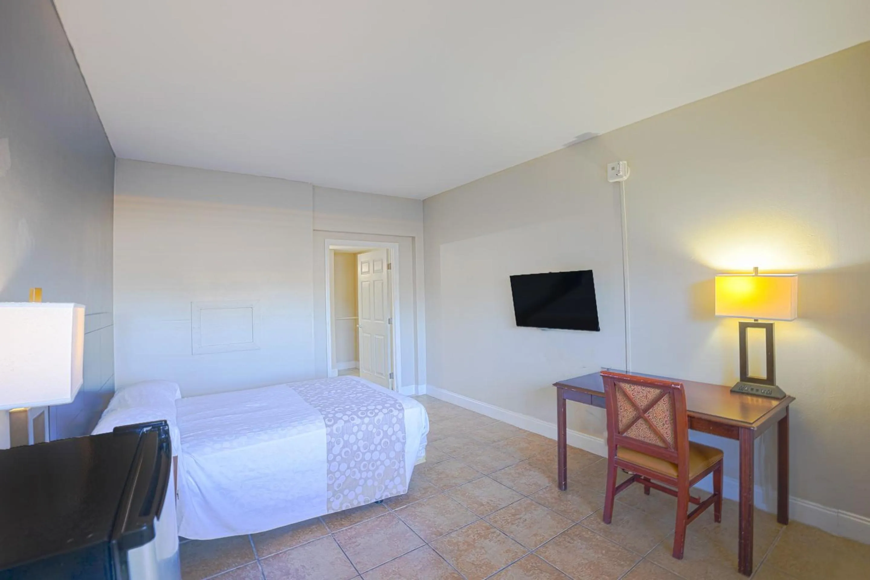 Bedroom, Bed in Sunrise Inn by OYO Titusville FL