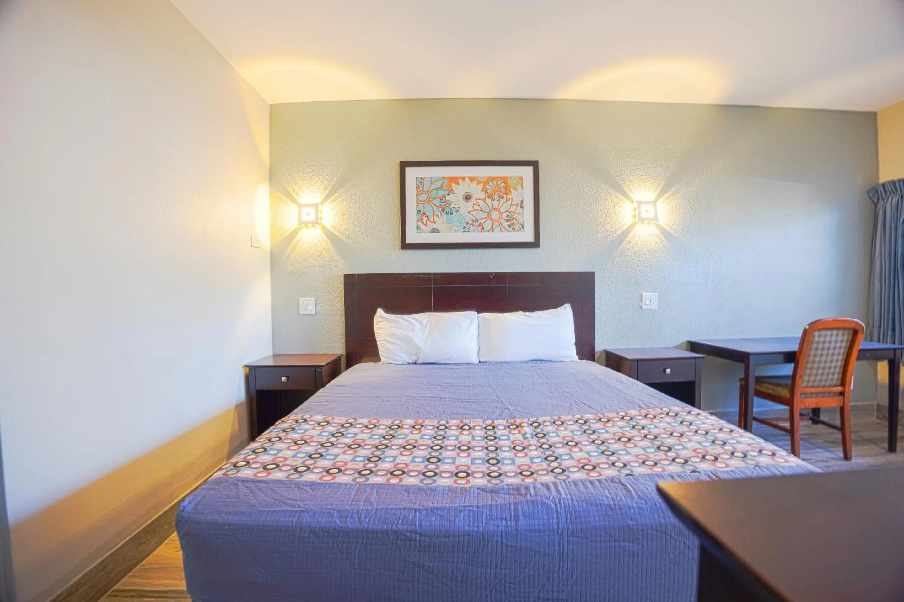 Bedroom, Bed in Sunrise Inn by OYO Titusville FL