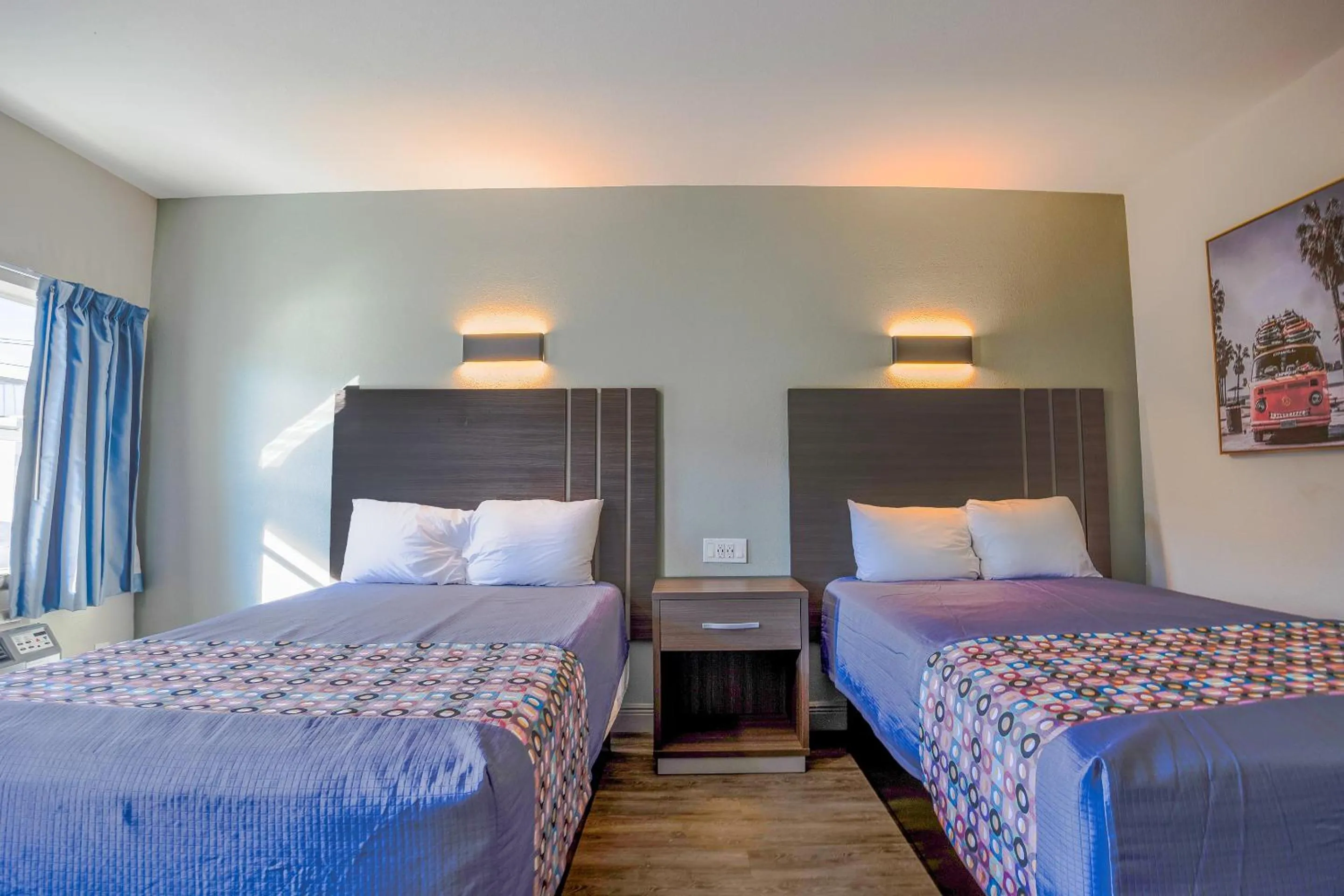 Bedroom, Bed in Sunrise Inn by OYO Titusville FL