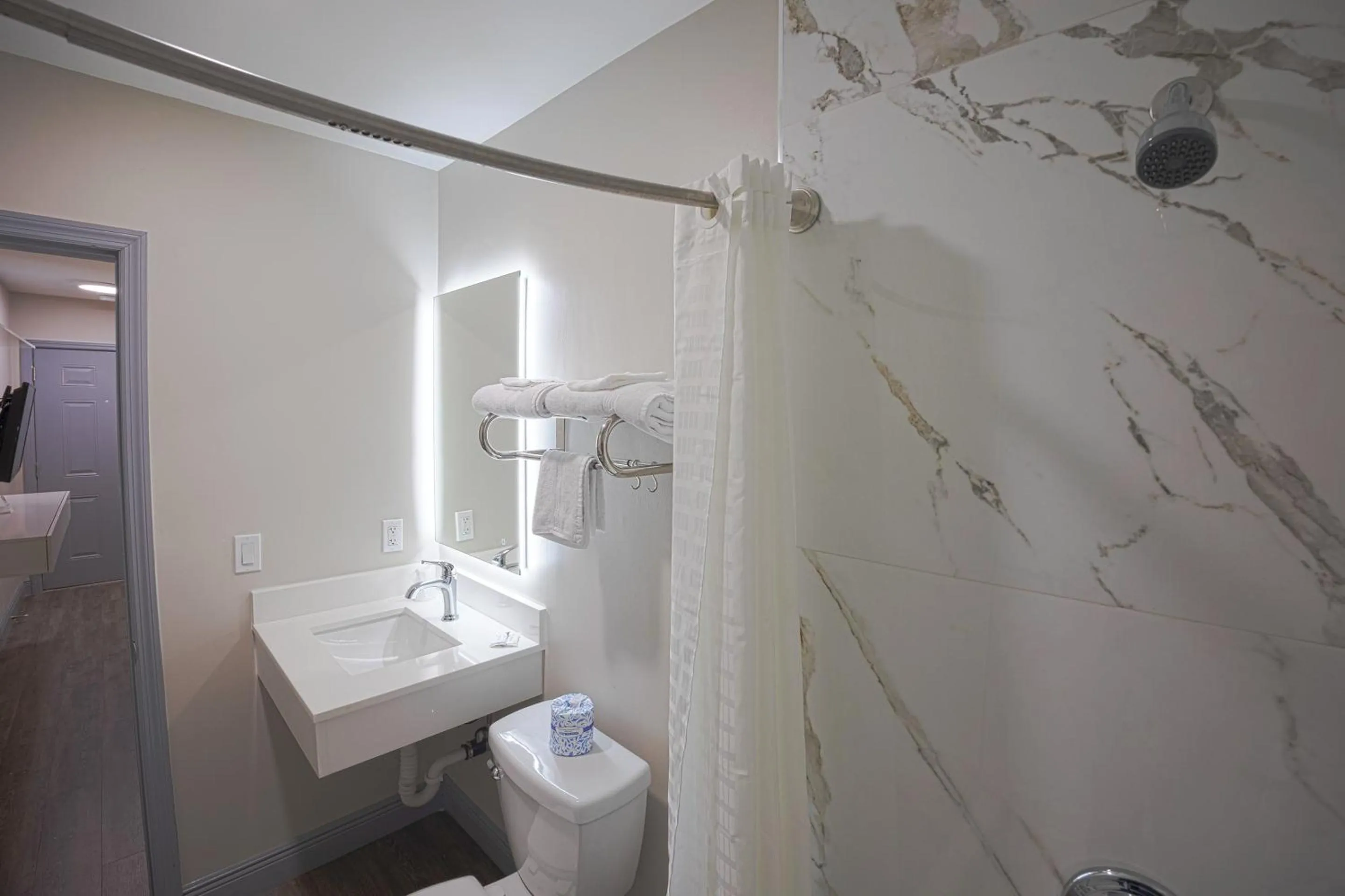 Bathroom in Sunrise Inn by OYO Titusville FL