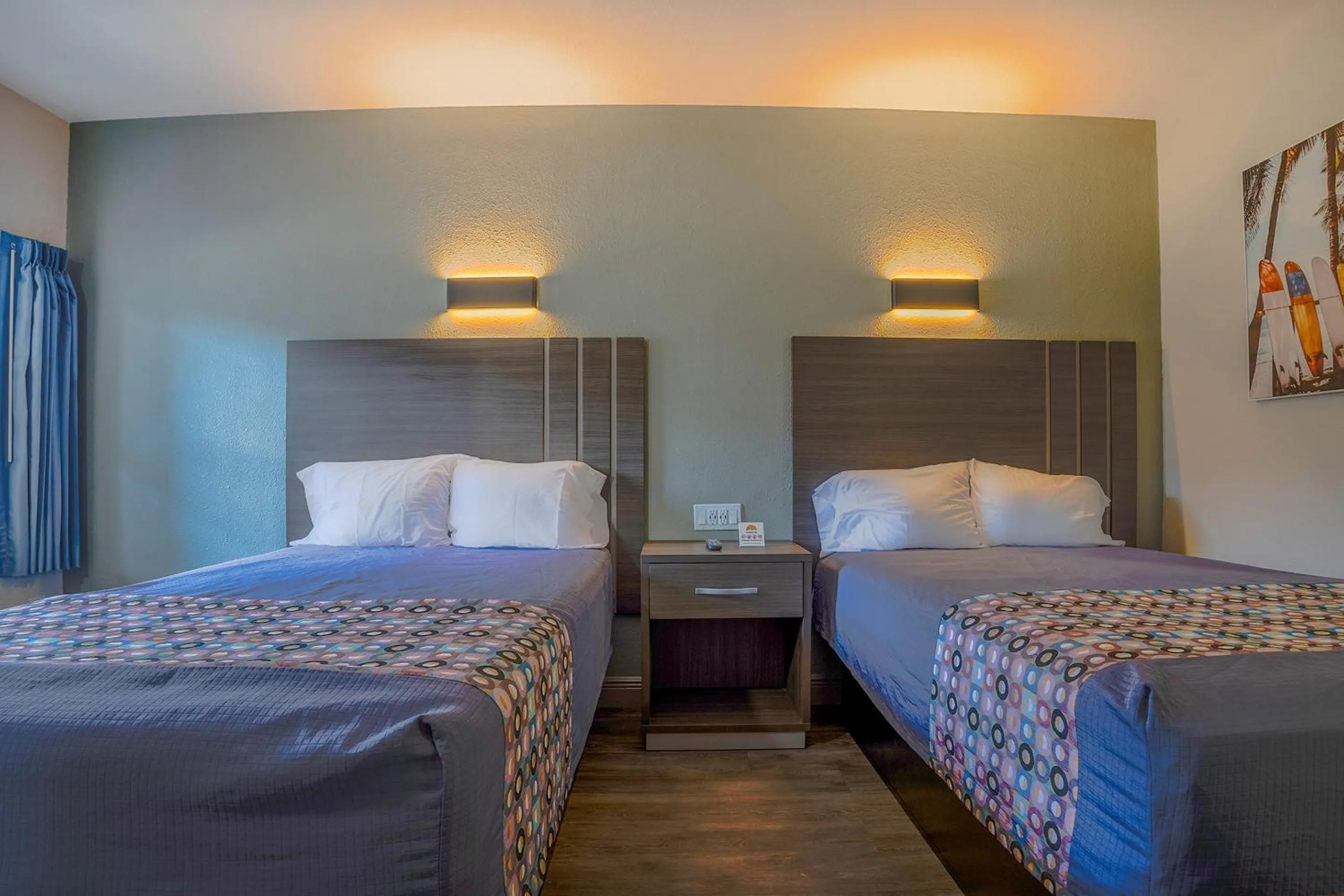 Bedroom, Bed in Sunrise Inn by OYO Titusville FL