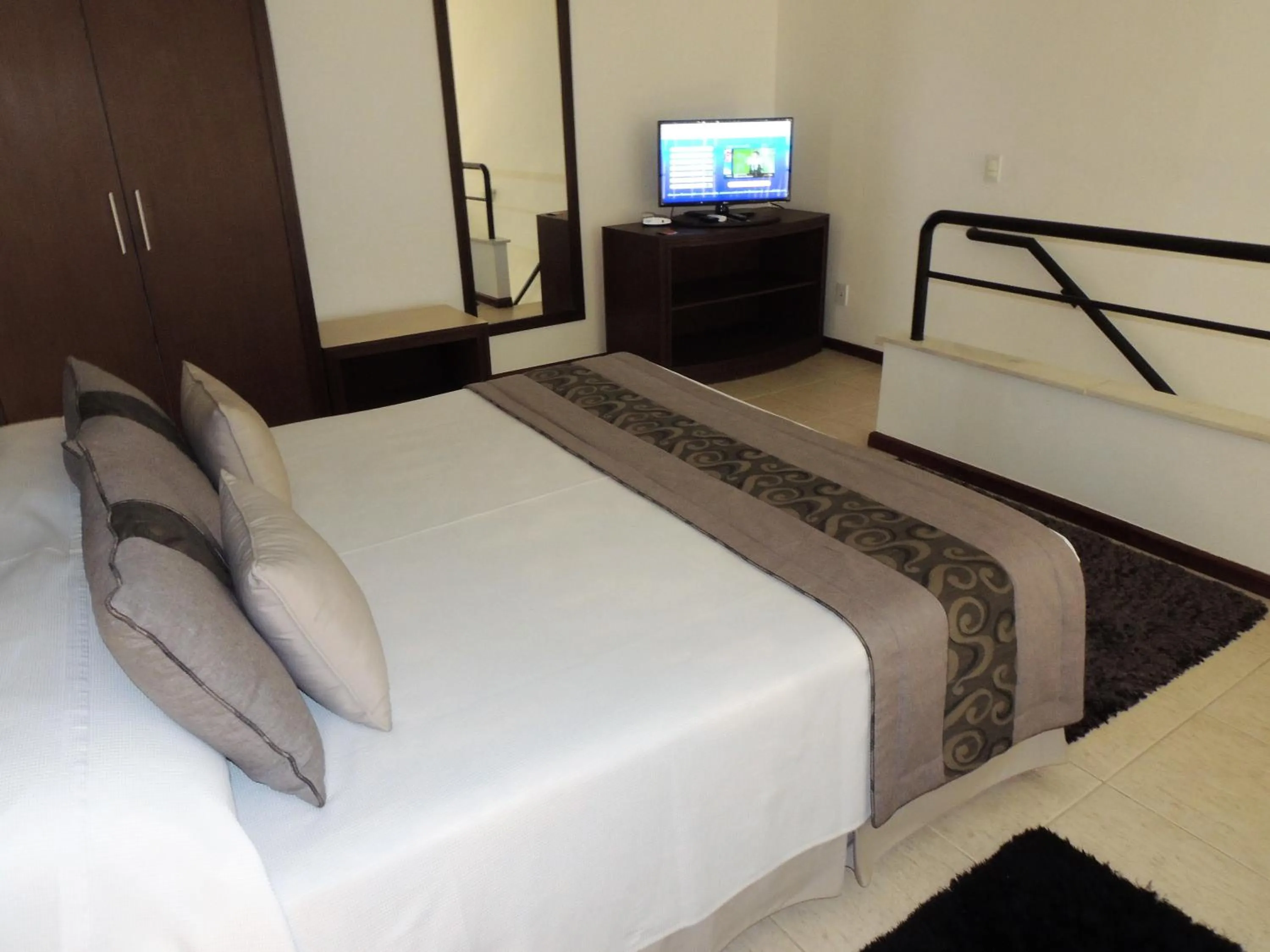 Bed in Mondrian Suite Hotel