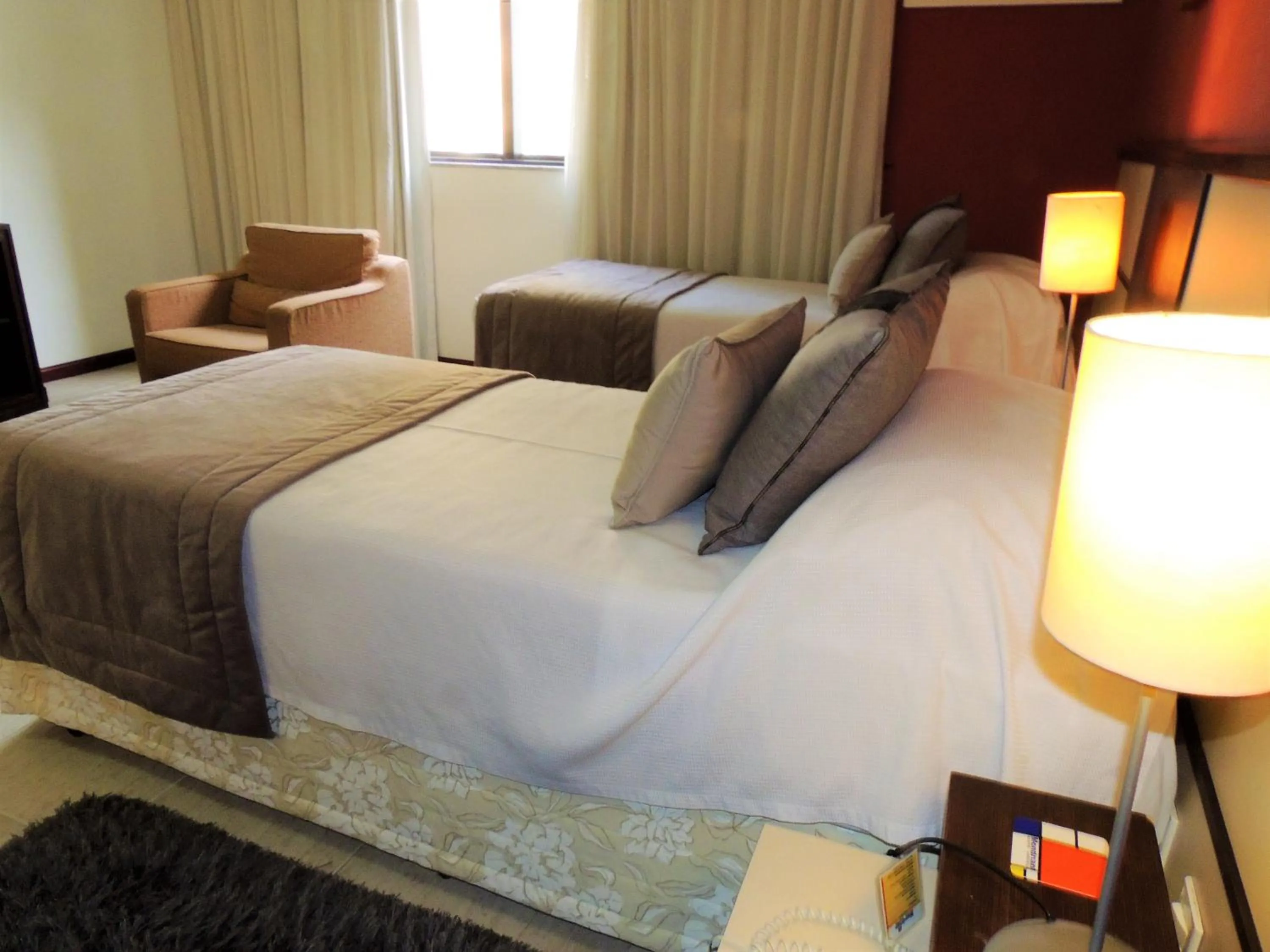 Bed in Mondrian Suite Hotel