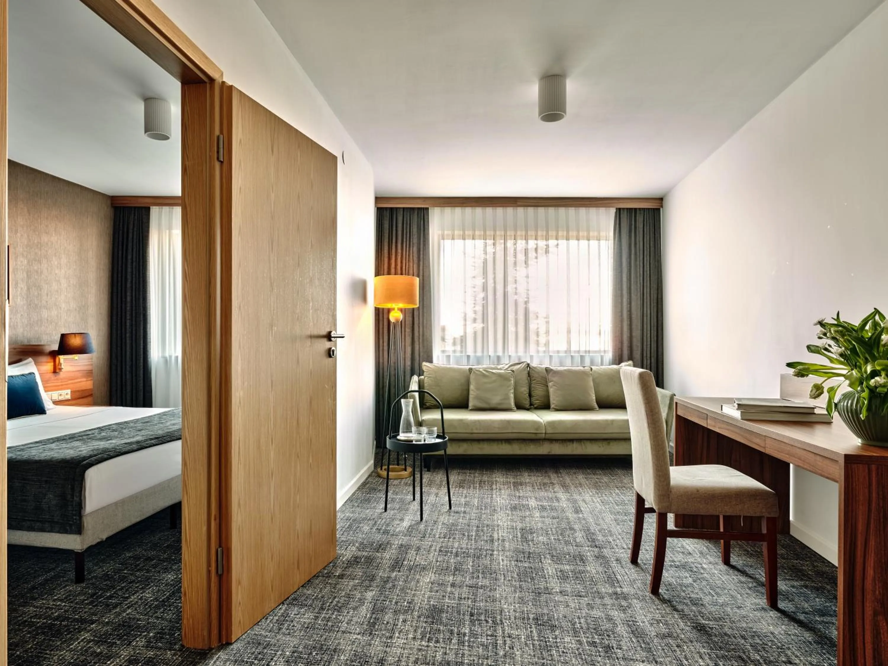 Living room, Bed in Arche Hotel Puławska Residence Warszawa