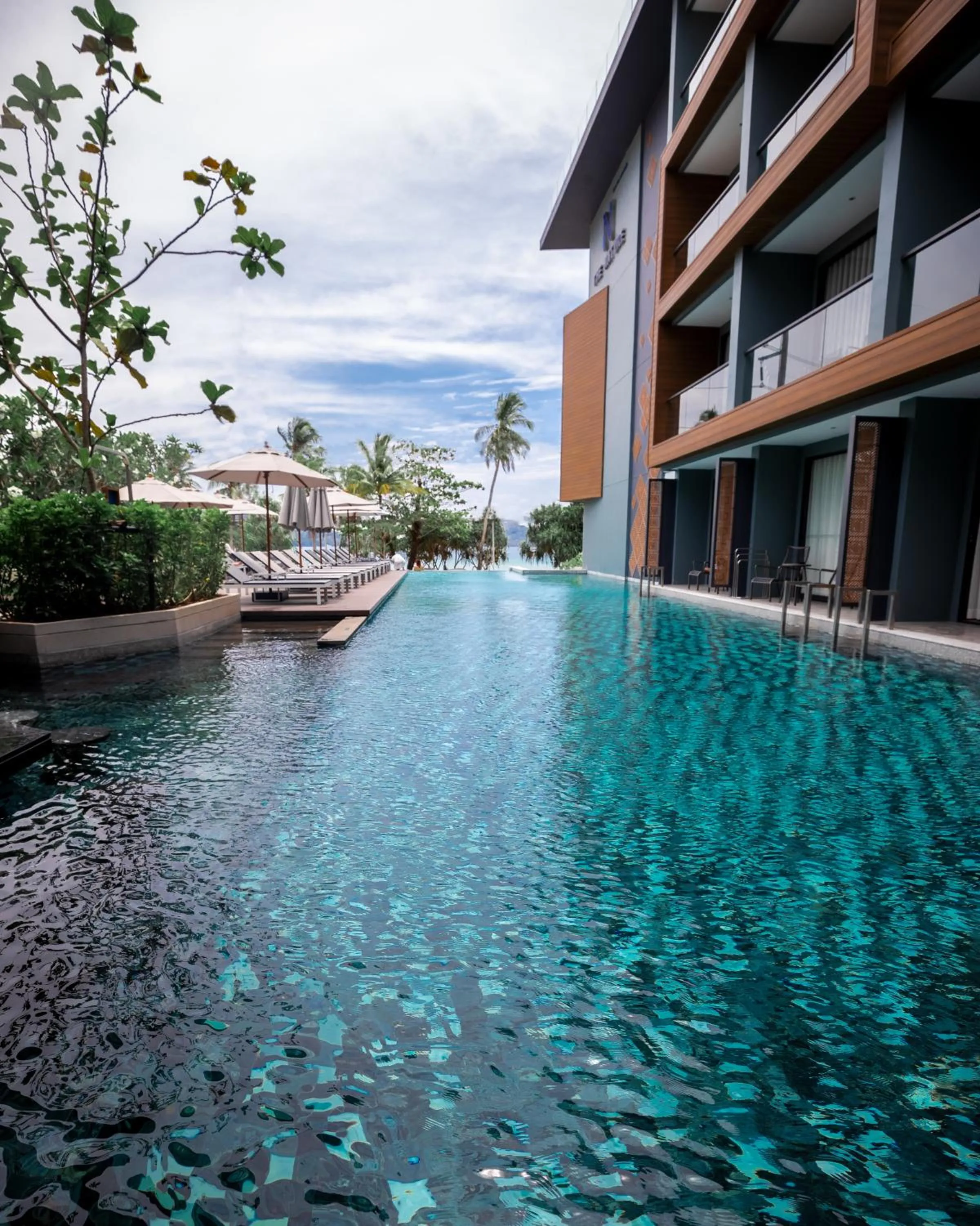 Swimming pool in The Nature Phuket - SHA Extra Plus