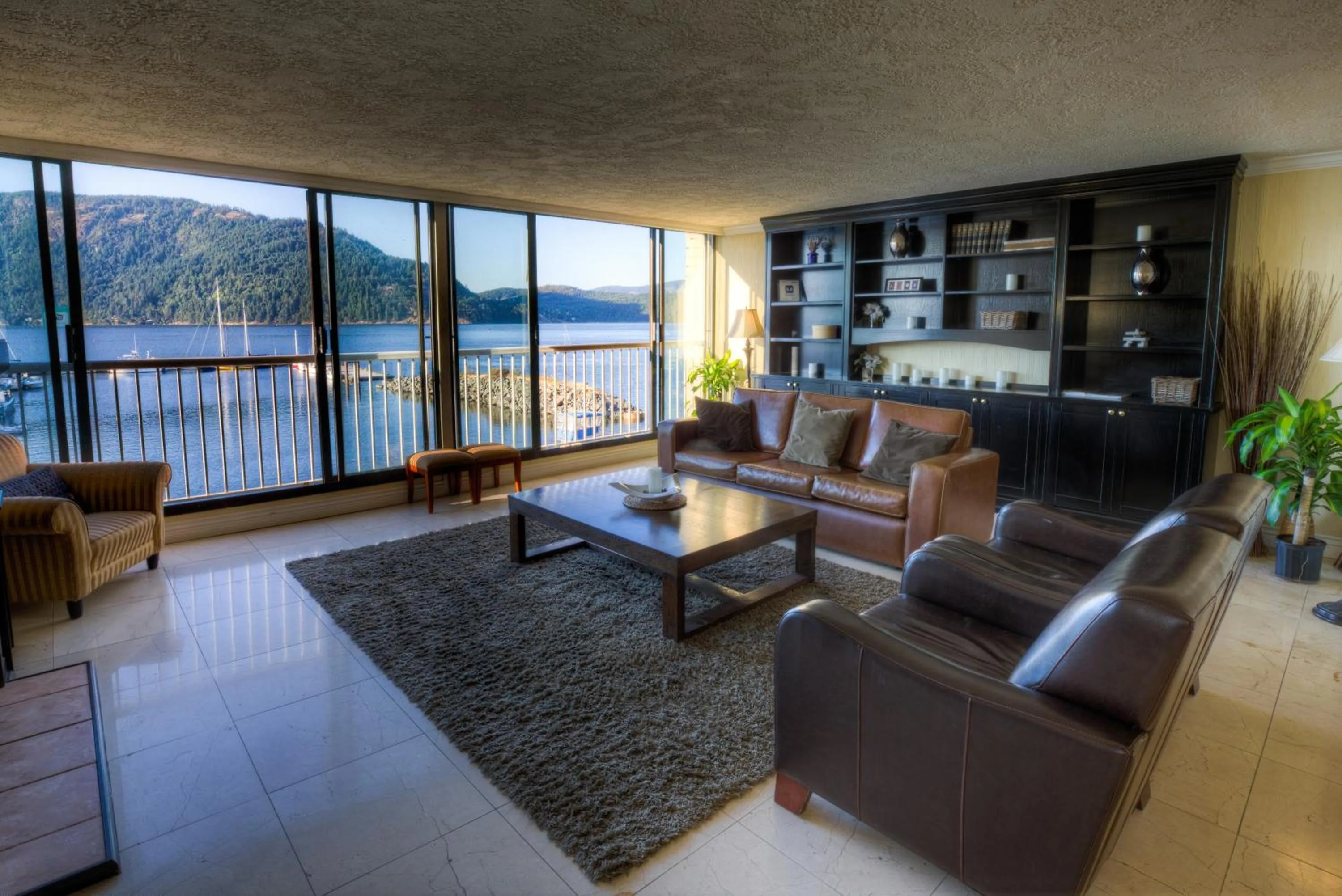 Communal lounge/ TV room in Oceanfront Suites at Cowichan Bay
