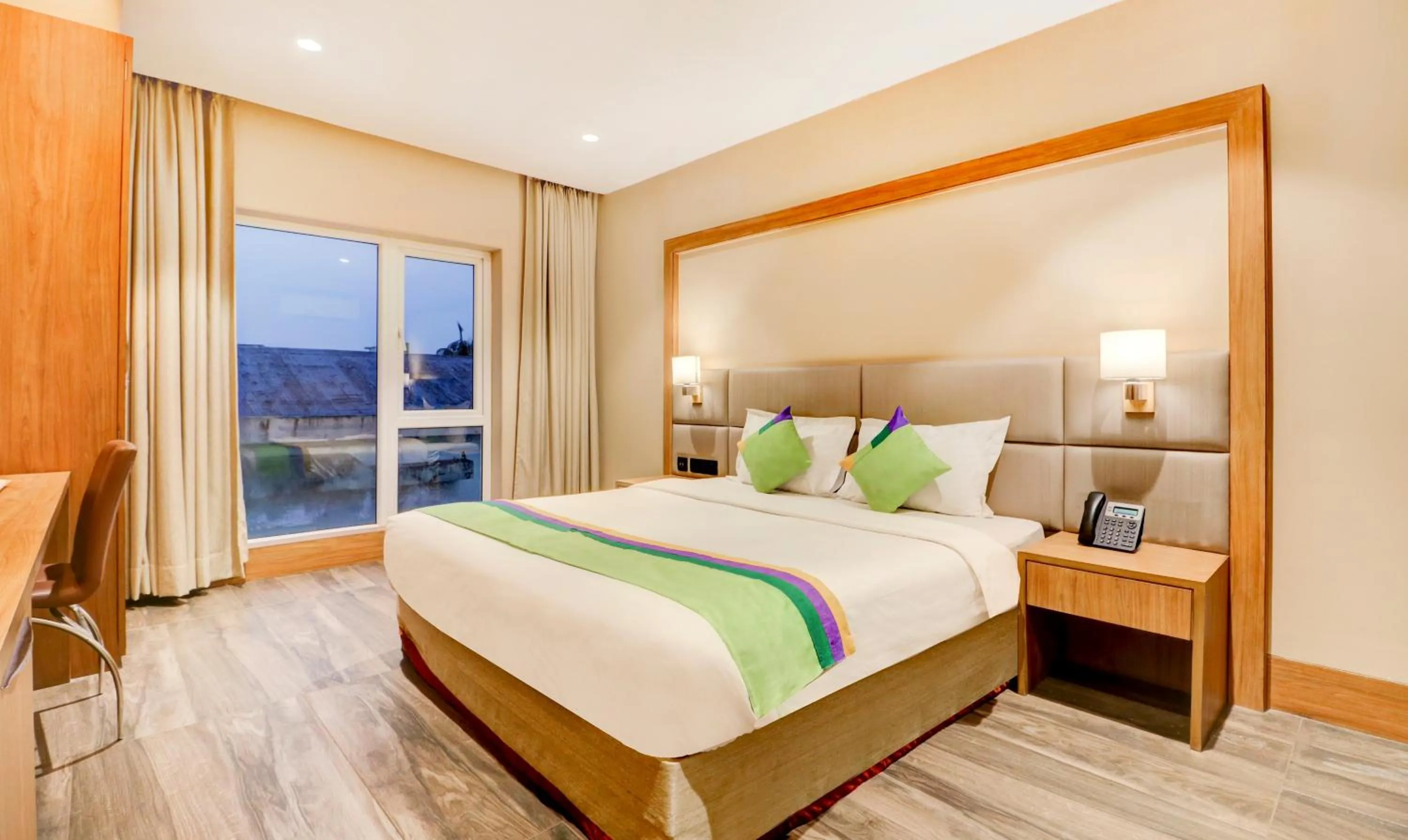 Bedroom, Bed in Treebo Radhe Palace, Lake Town