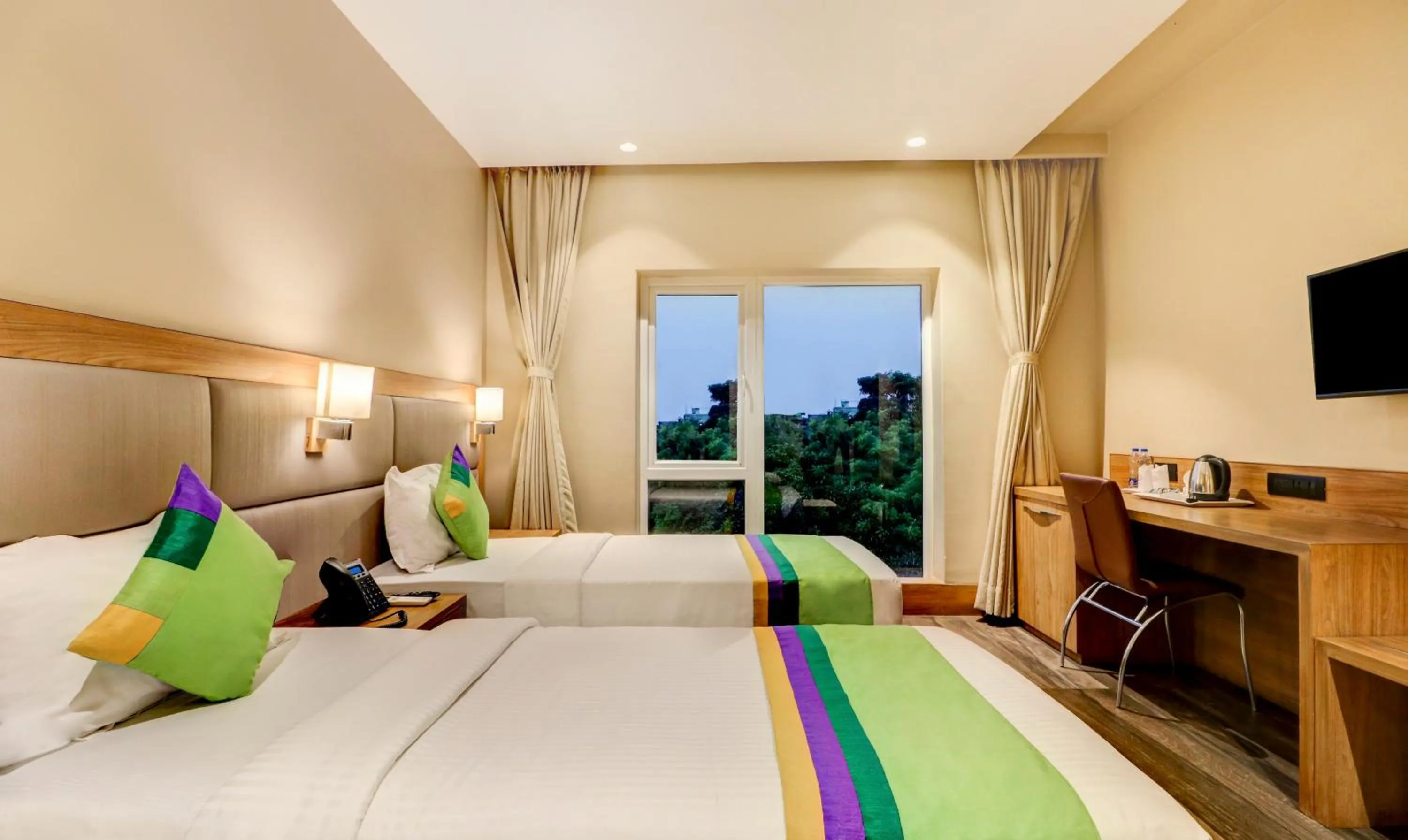 Bedroom, Bed in Treebo Radhe Palace, Lake Town