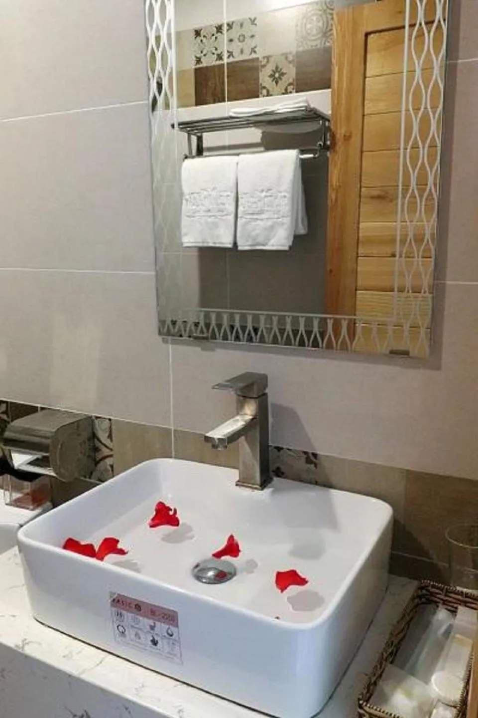 Bathroom in Marigold Hotel & Apartment