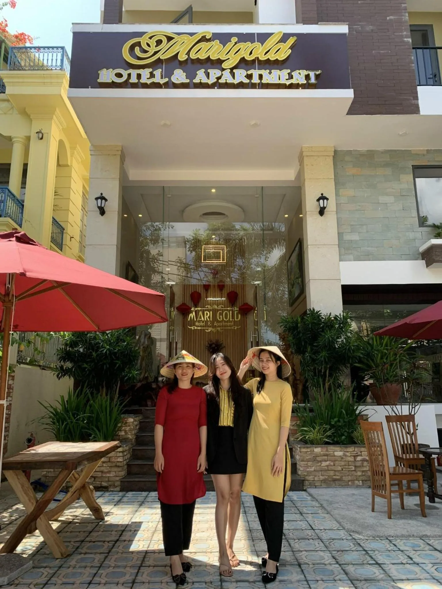 Property building in Marigold Hotel & Apartment