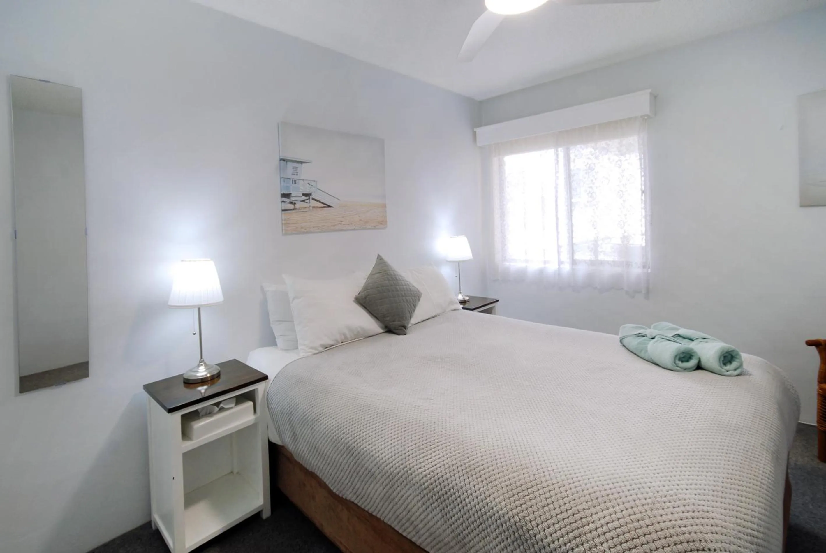 Bed in Marcel Towers Holiday Apartments