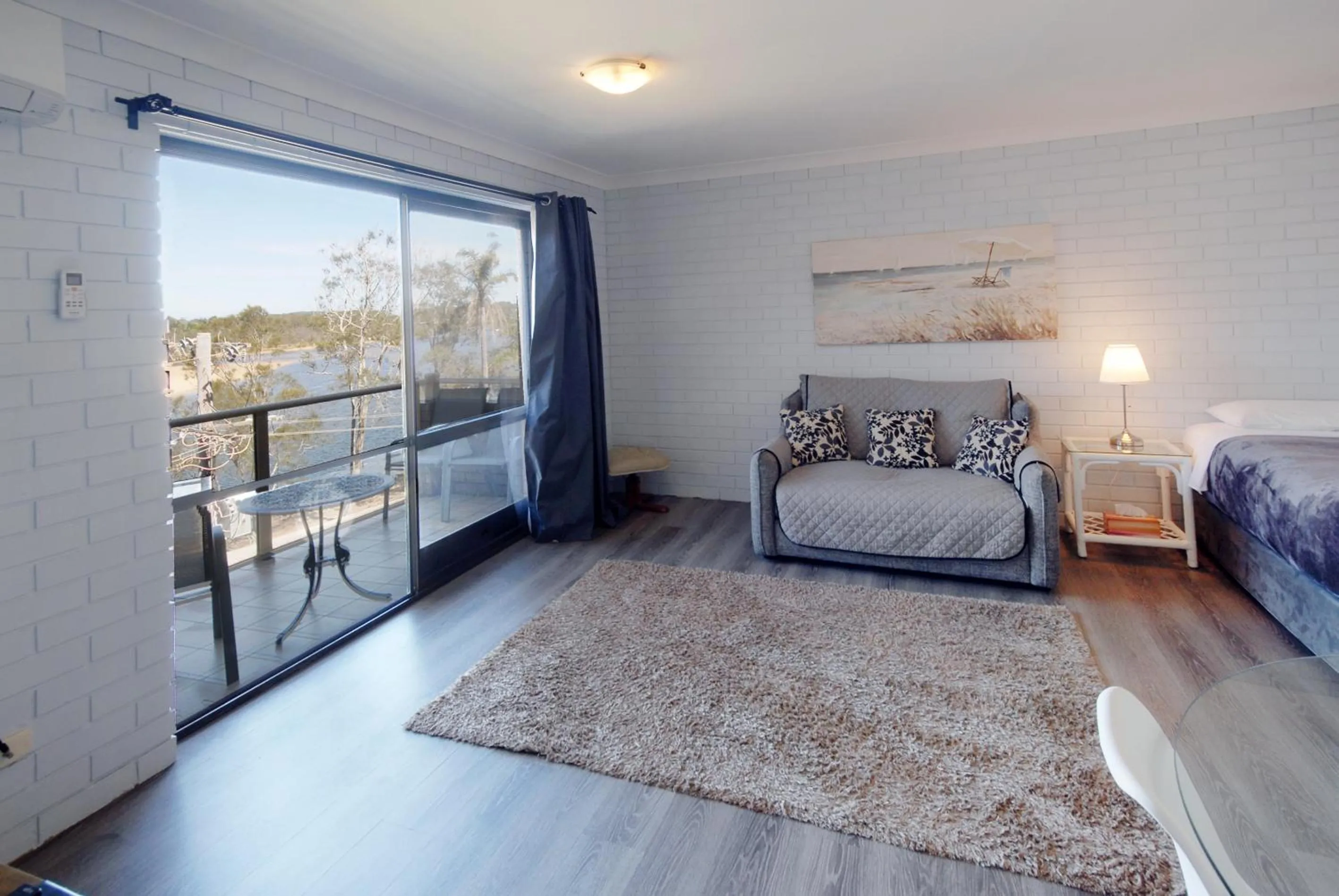 Bed in Marcel Towers Holiday Apartments