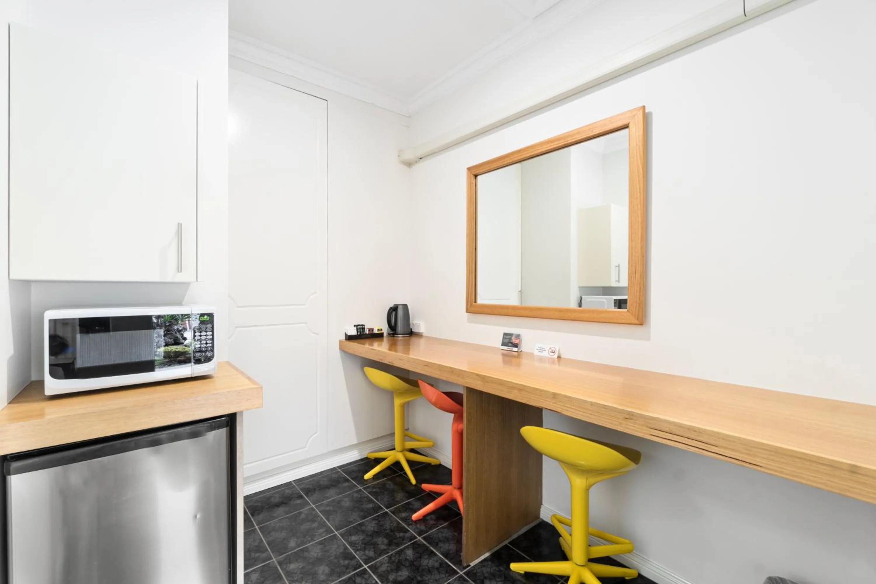 Kitchen or kitchenette in The International Motel Apollo Bay