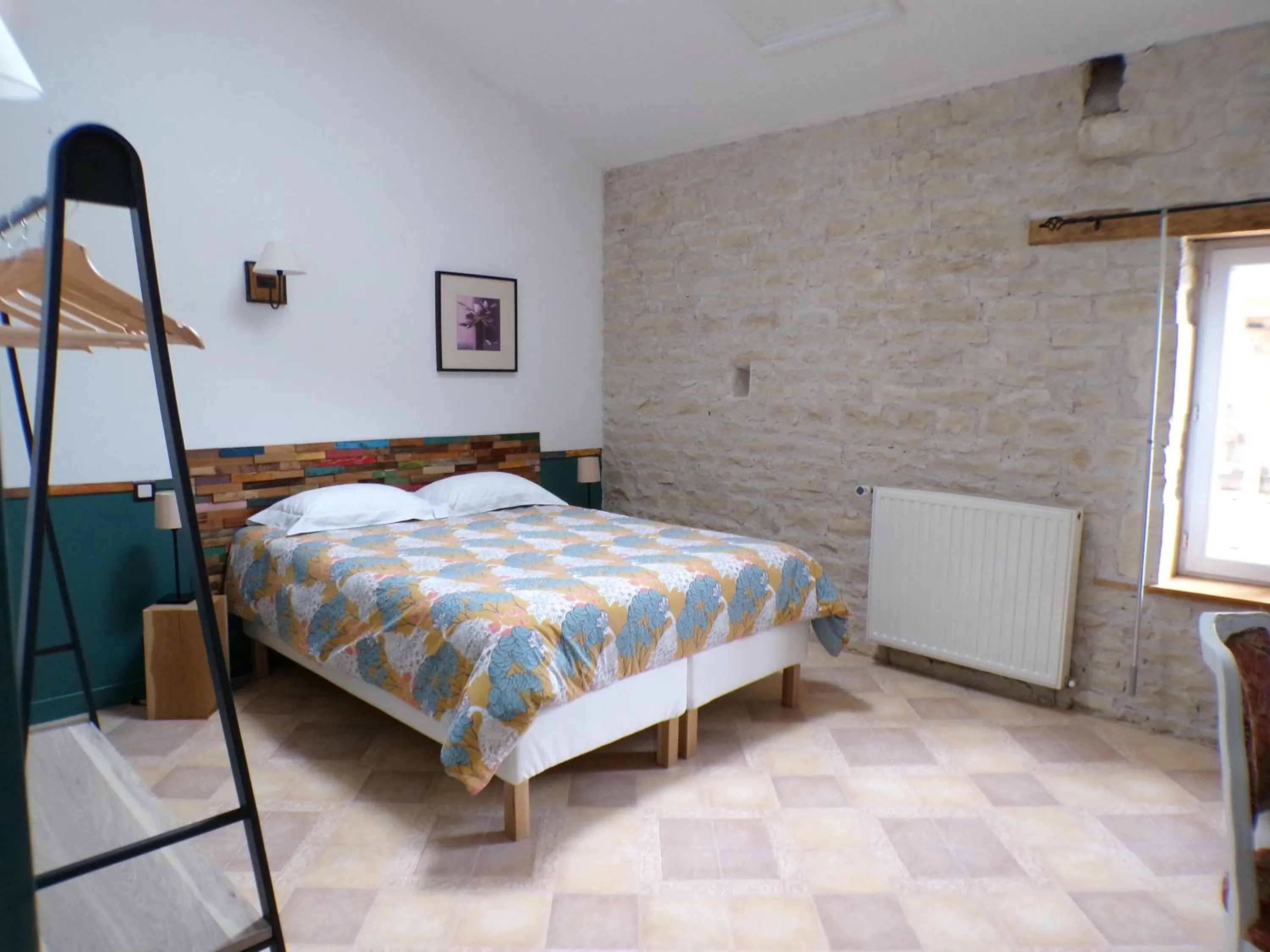 Bed in Le Logis de la Venise Verte