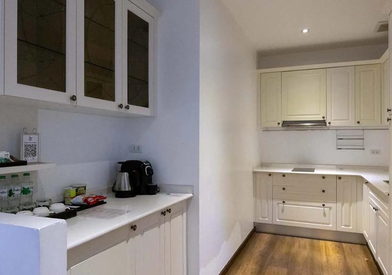 Kitchen or kitchenette in Le Thatluang D'oR Boutique Hotel