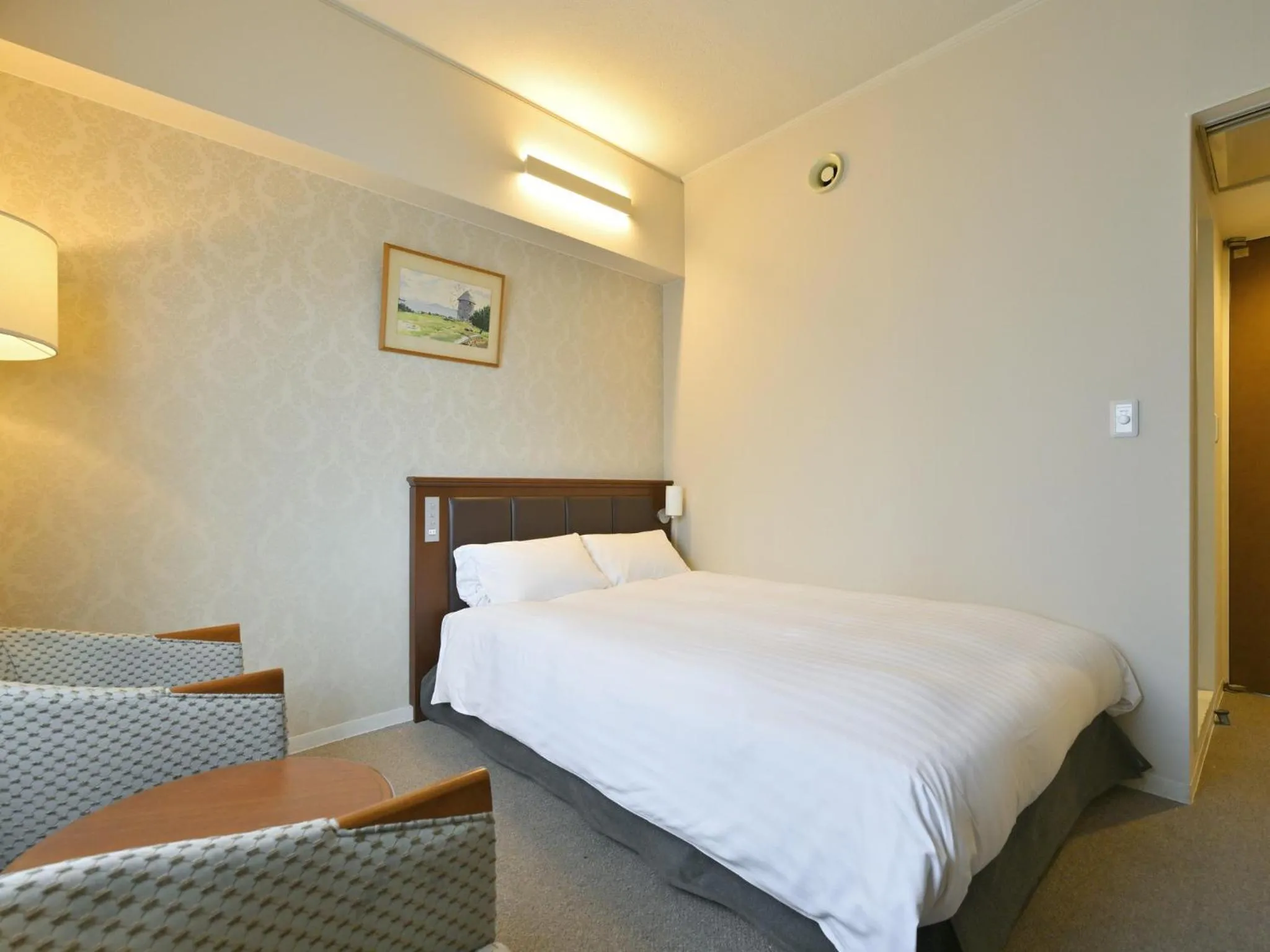Bed in Rihga Hotel Zest Takamatsu