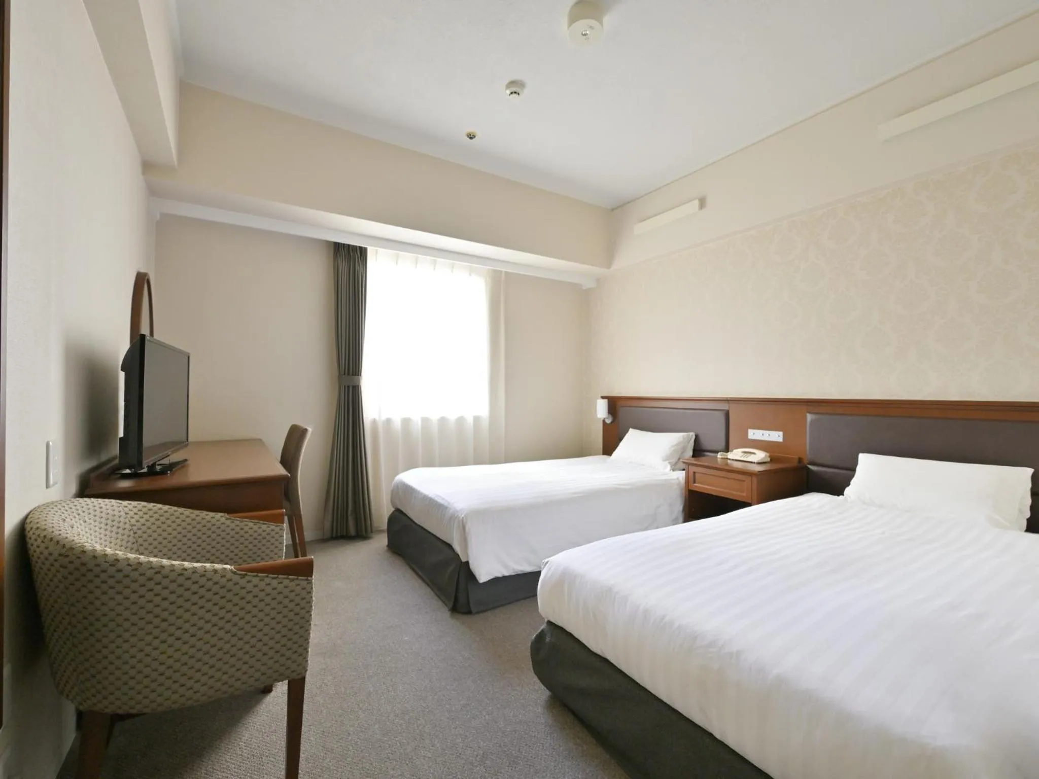 Bed in Rihga Hotel Zest Takamatsu