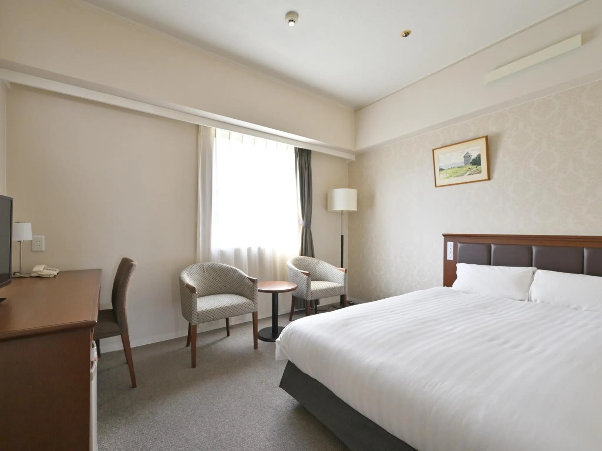 Bed in Rihga Hotel Zest Takamatsu