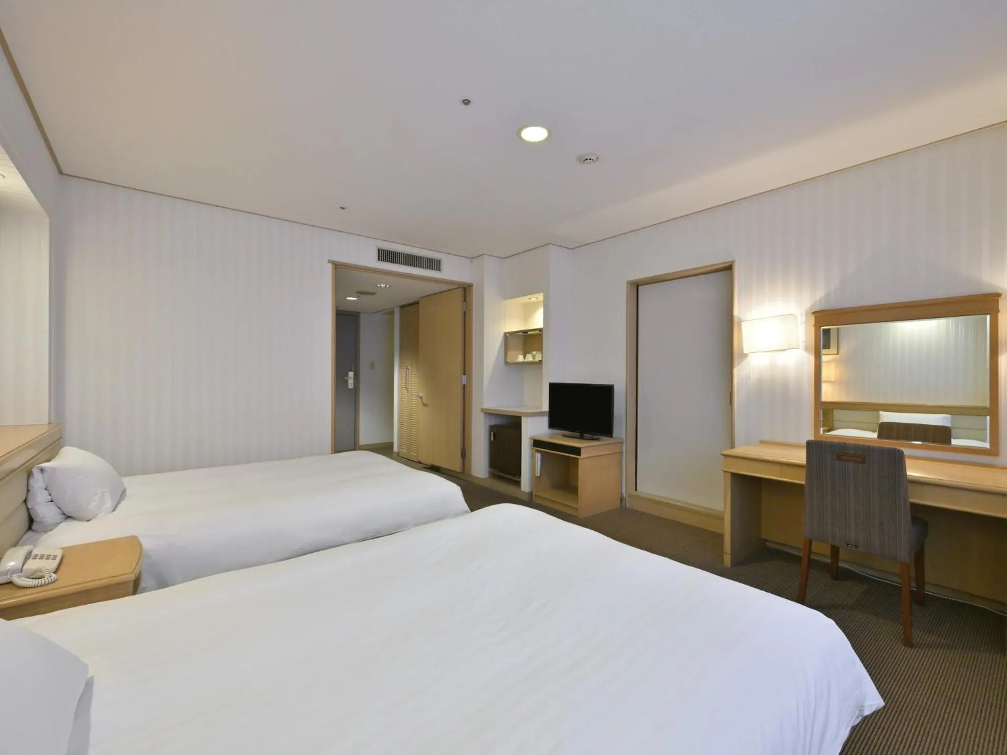 Bed in Rihga Hotel Zest Takamatsu