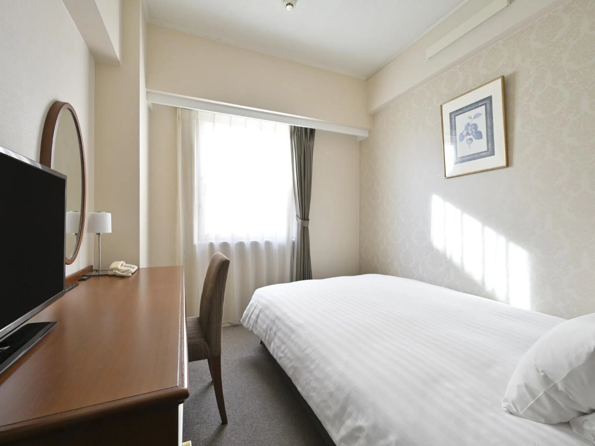 Bed in Rihga Hotel Zest Takamatsu