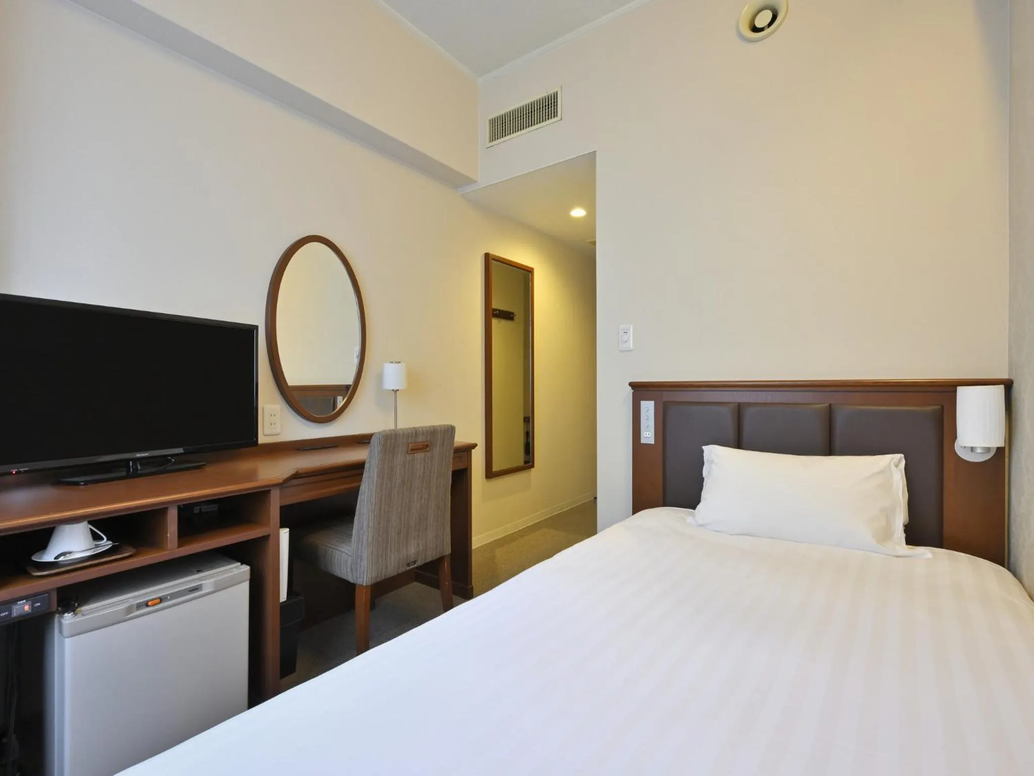 Bed in Rihga Hotel Zest Takamatsu