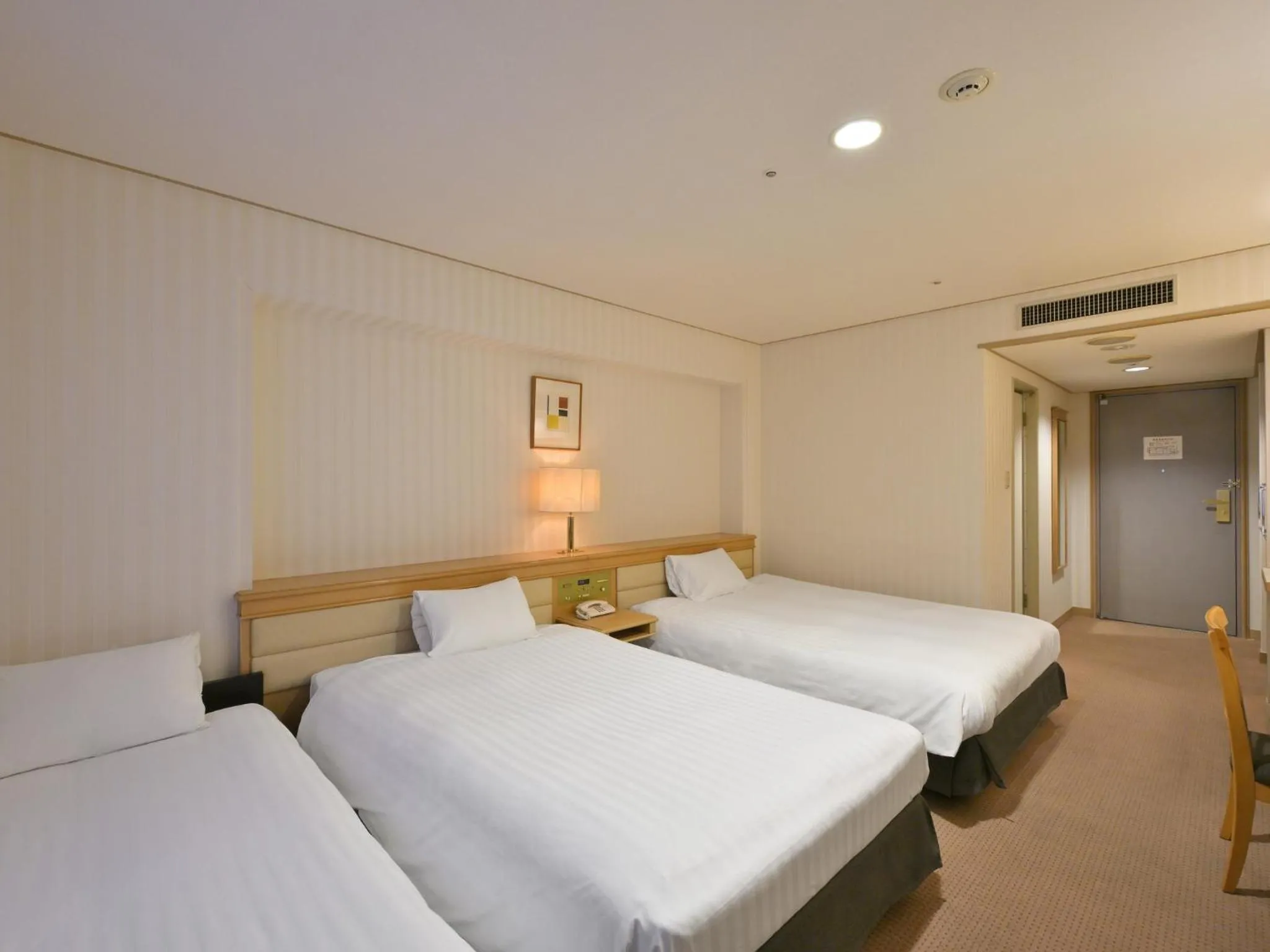 Bed in Rihga Hotel Zest Takamatsu
