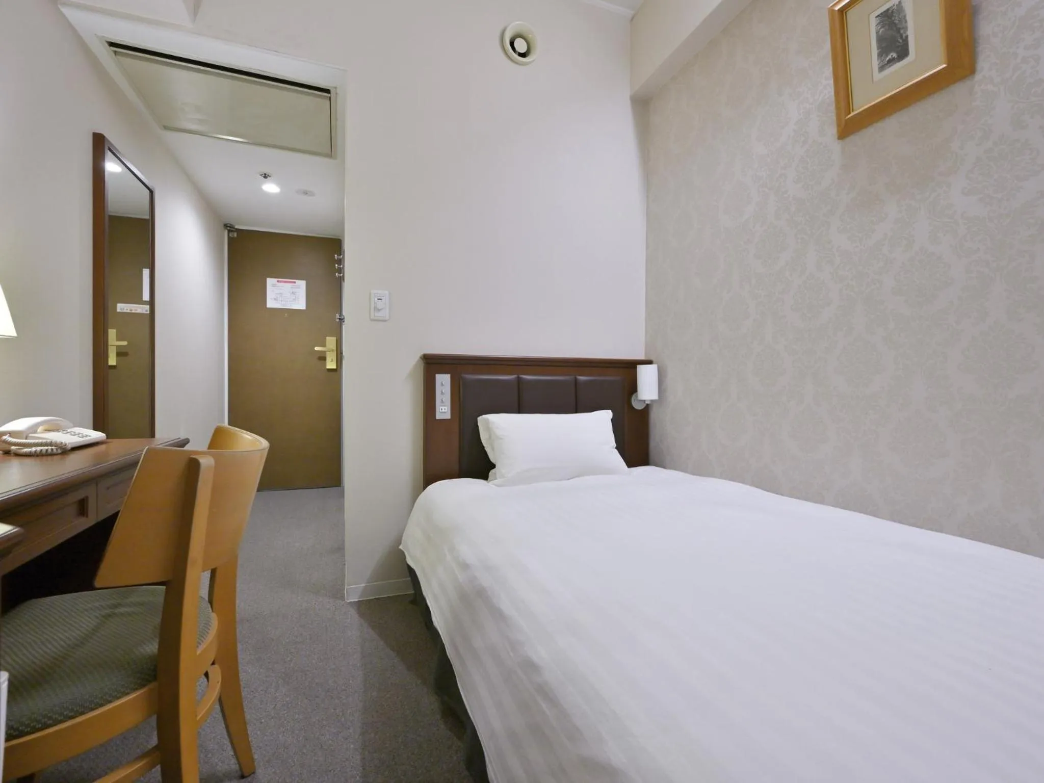 Bed in Rihga Hotel Zest Takamatsu