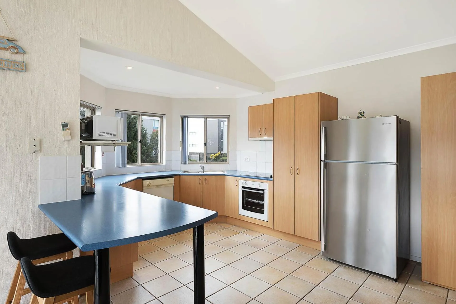 Kitchen or kitchenette in Sails Luxury Apartments Merimbula