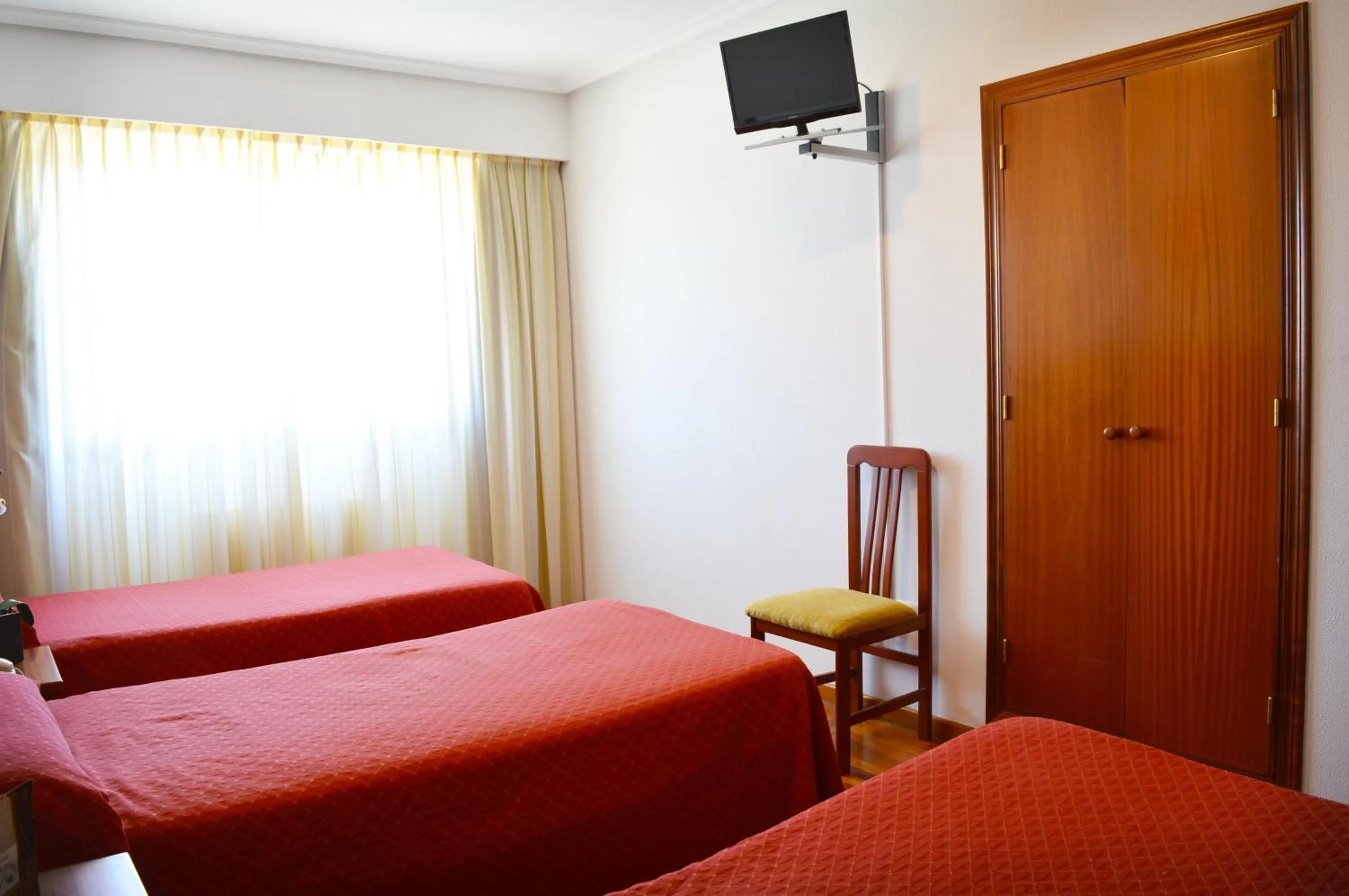 Bed in Hotel Os Caracoles