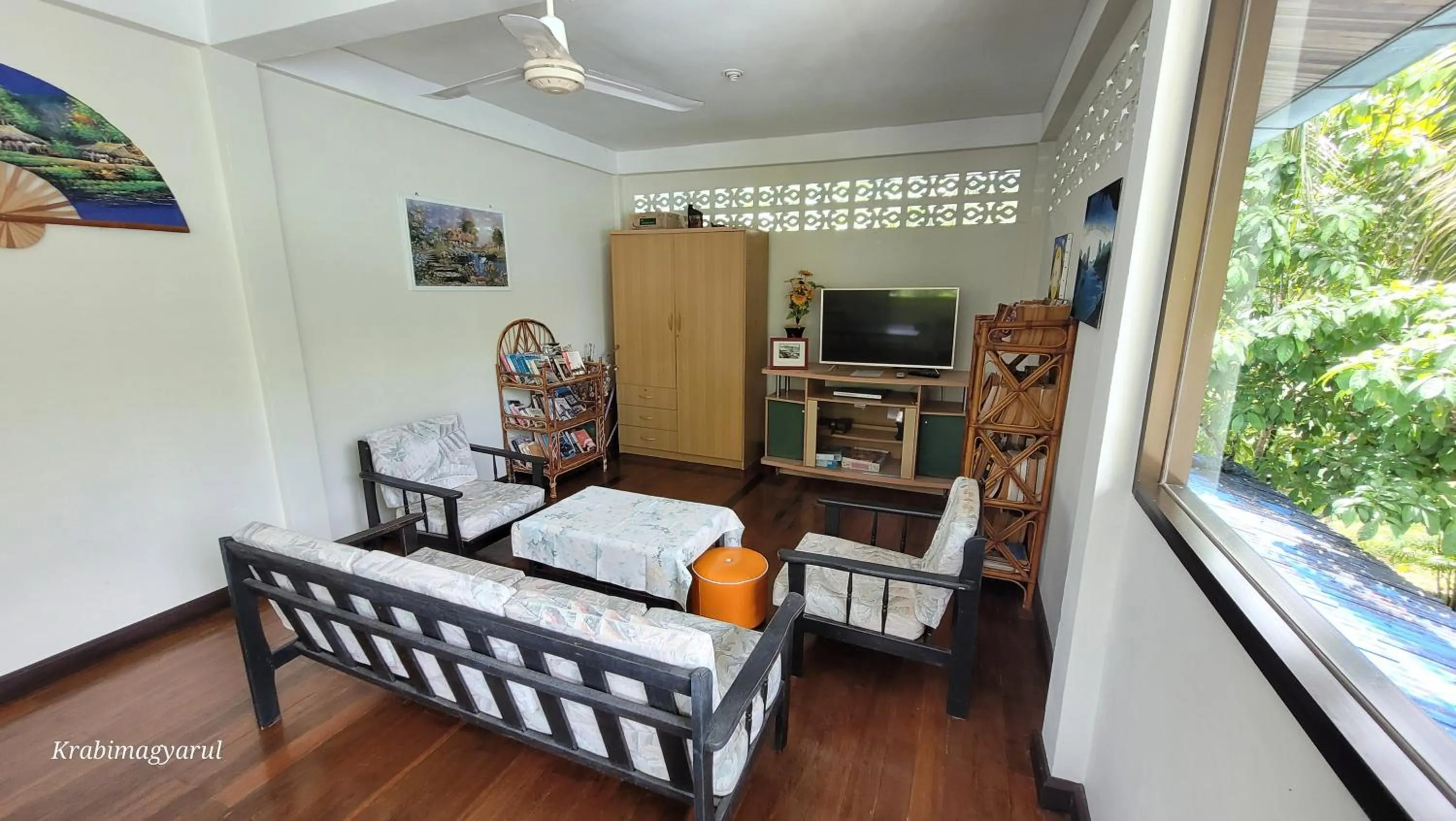 Communal lounge/ TV room, Bed in Sabai Resort