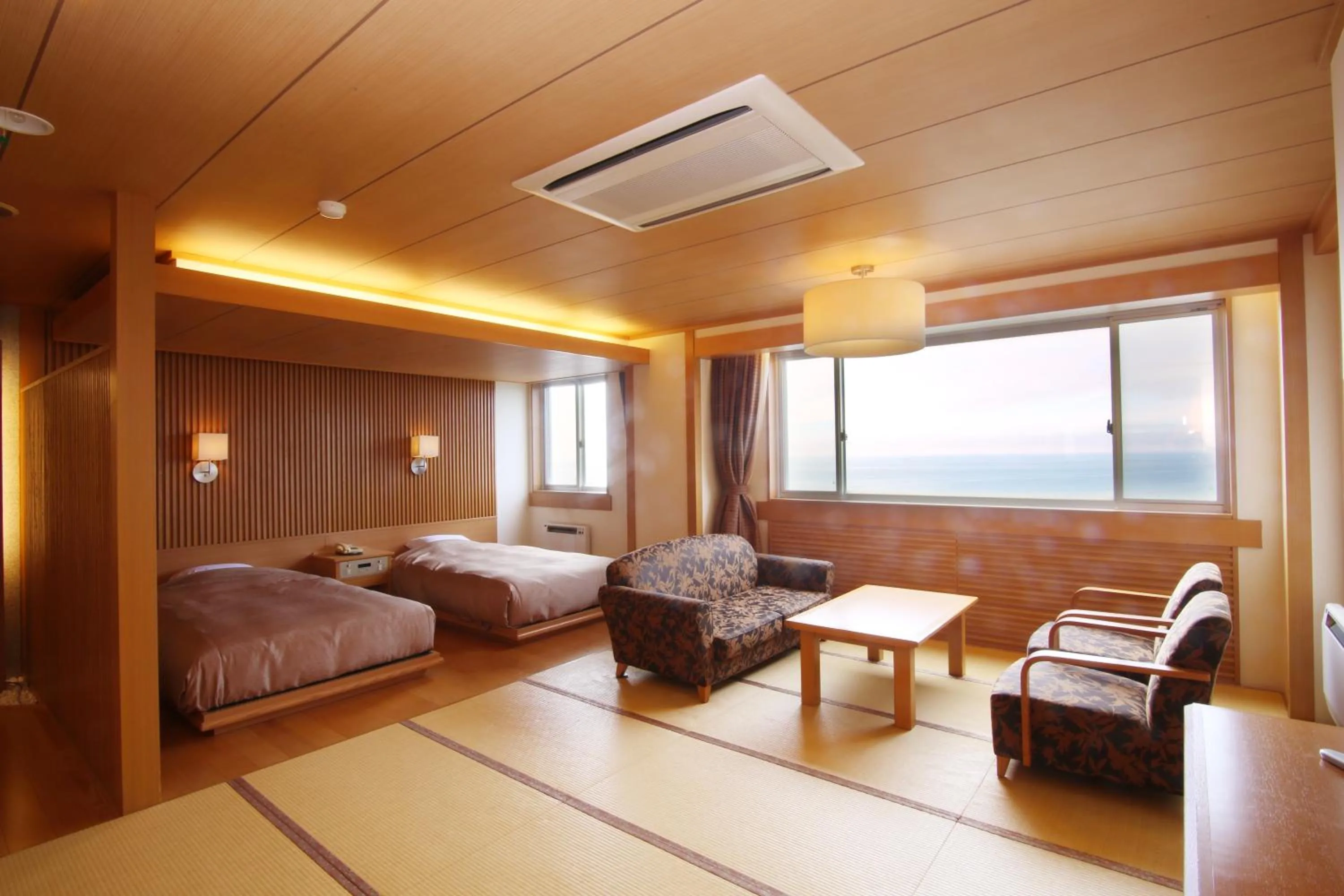 Living room, Bed in Shiretoko Daiichi Hotel