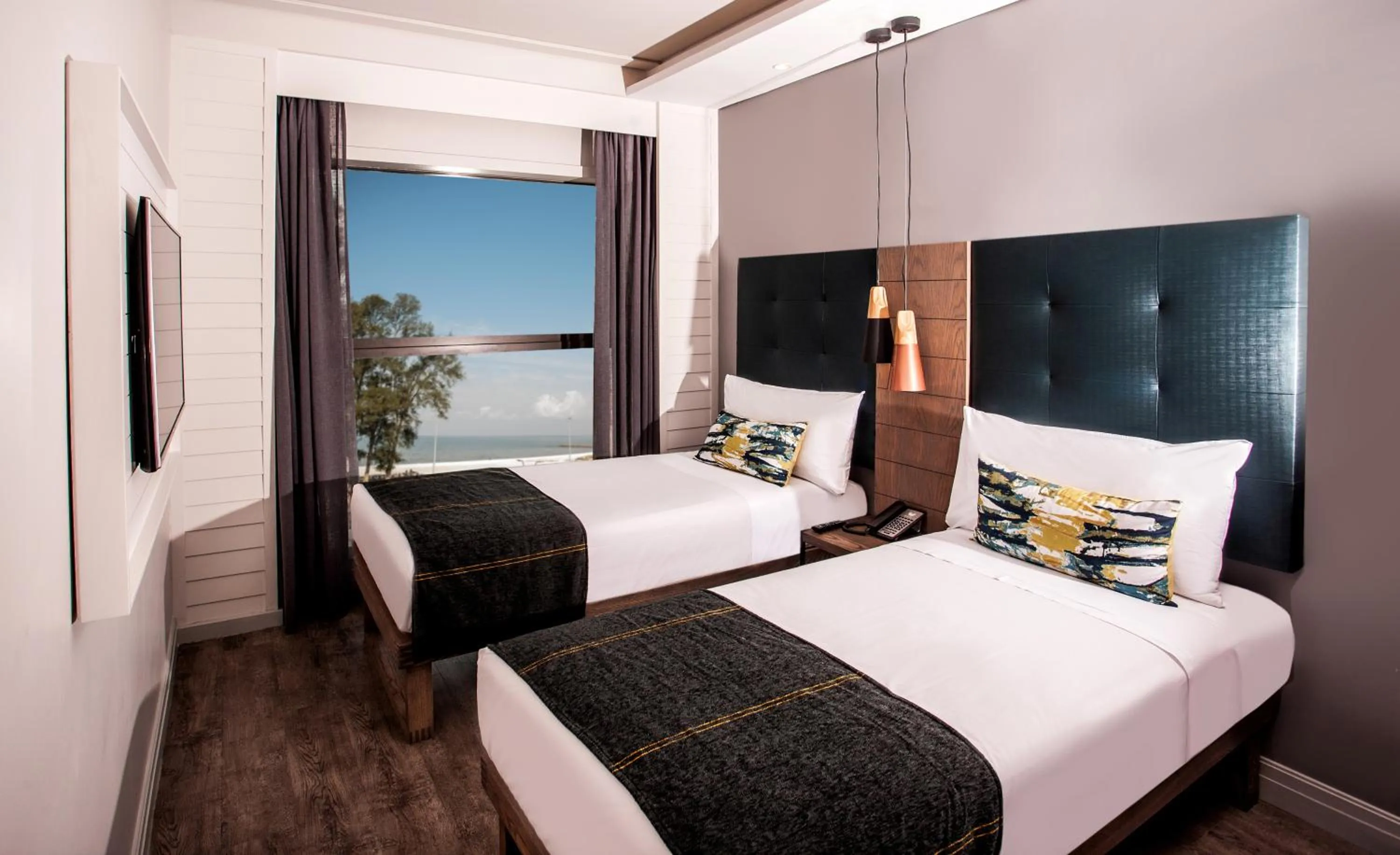 Bed in StayEasy Maputo