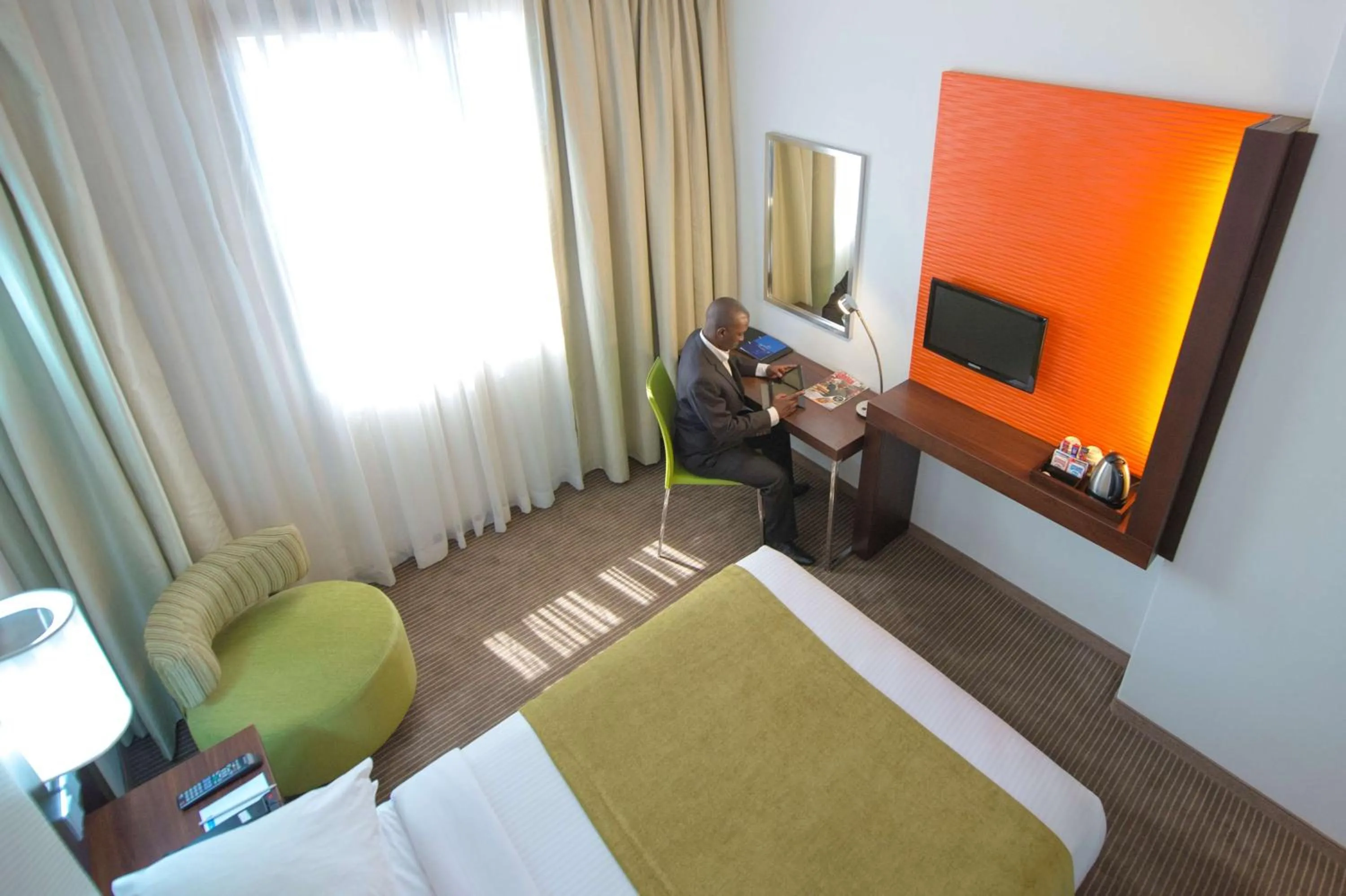 Photo of the whole room, Bed in StayEasy Lusaka
