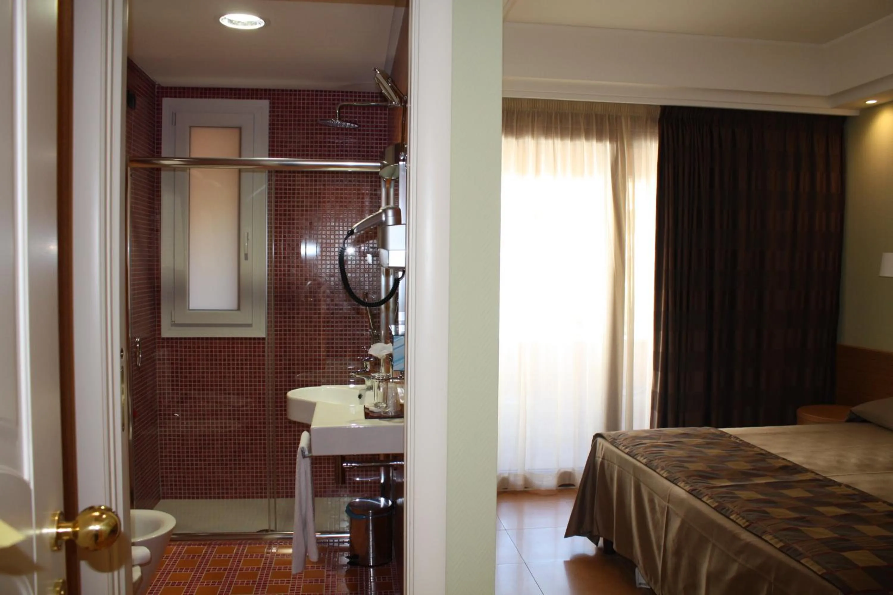 Bathroom, Bed in Artemis Hotel