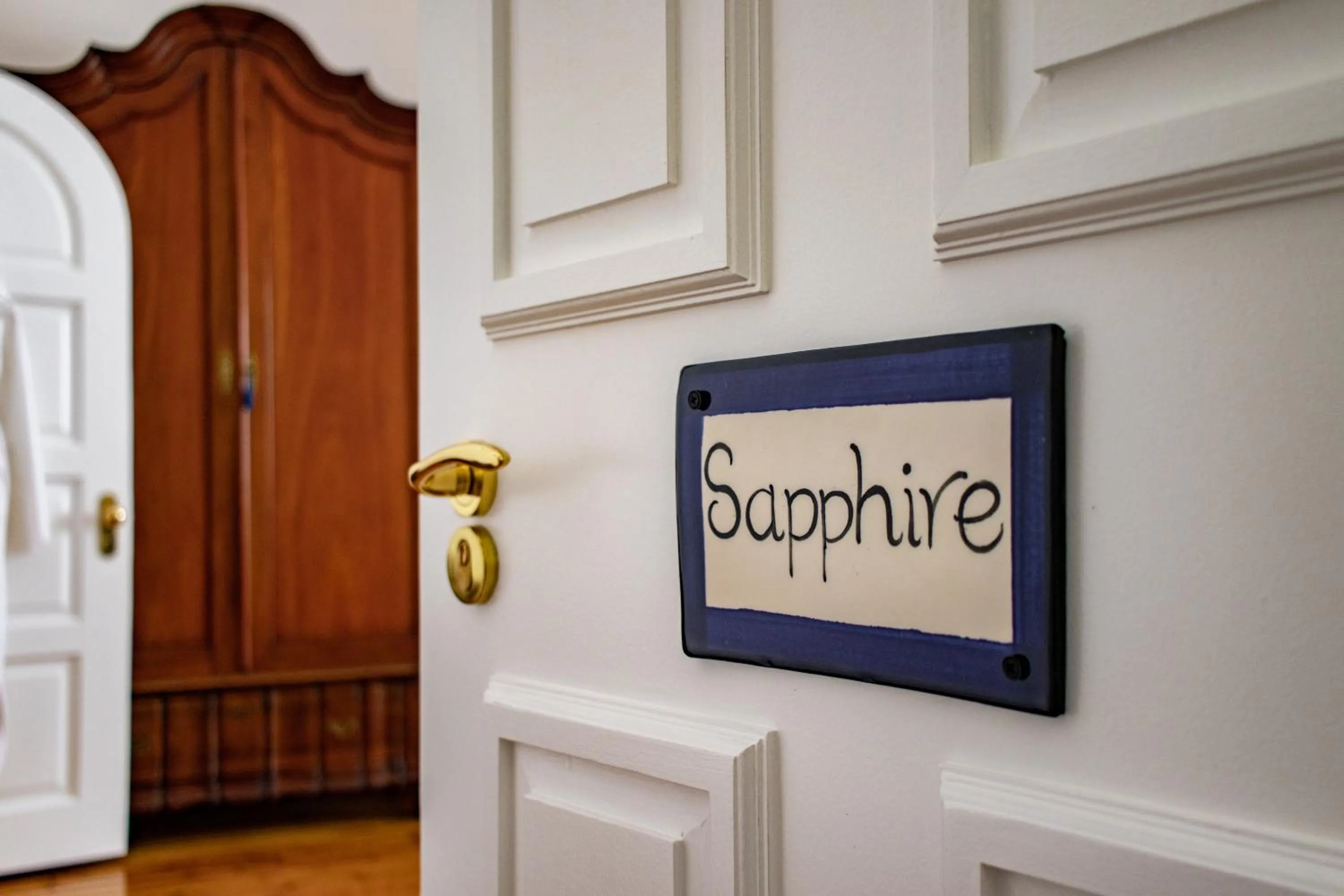 Property logo or sign in Carmichael House Boutique Hotel