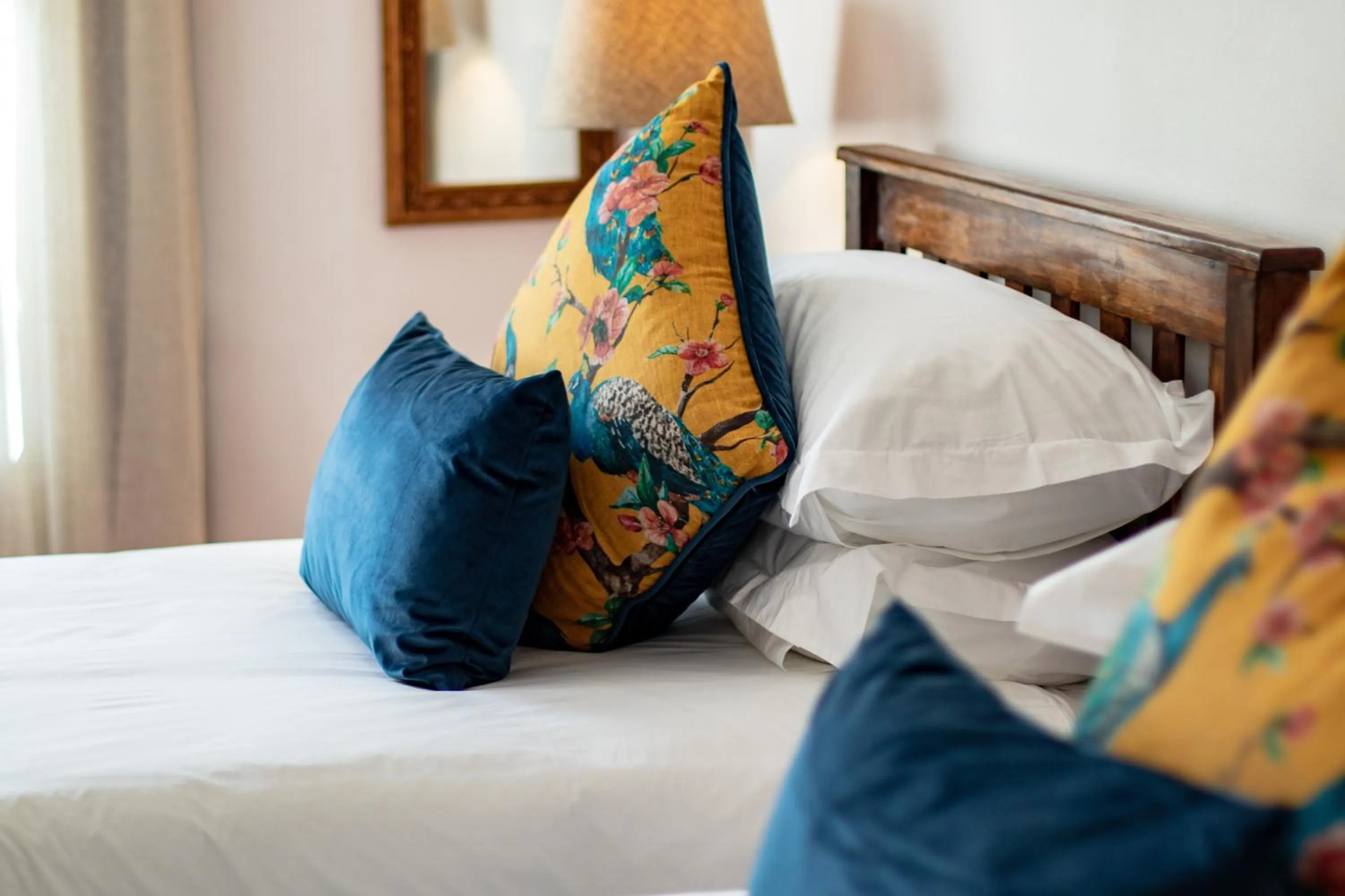 Bed in Carmichael House Boutique Hotel